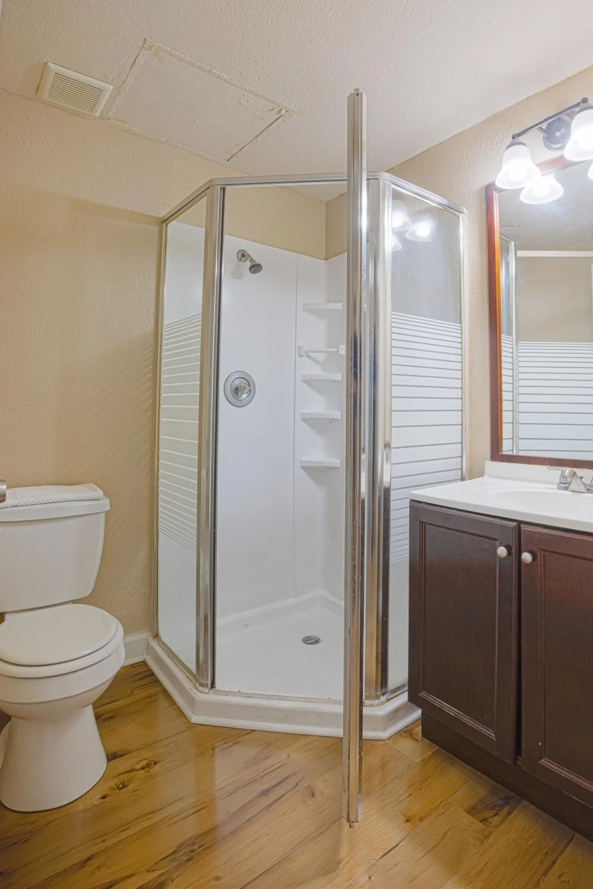 Bathroom in Liberty Garden Inn by OYO Kissimmee near Disney World