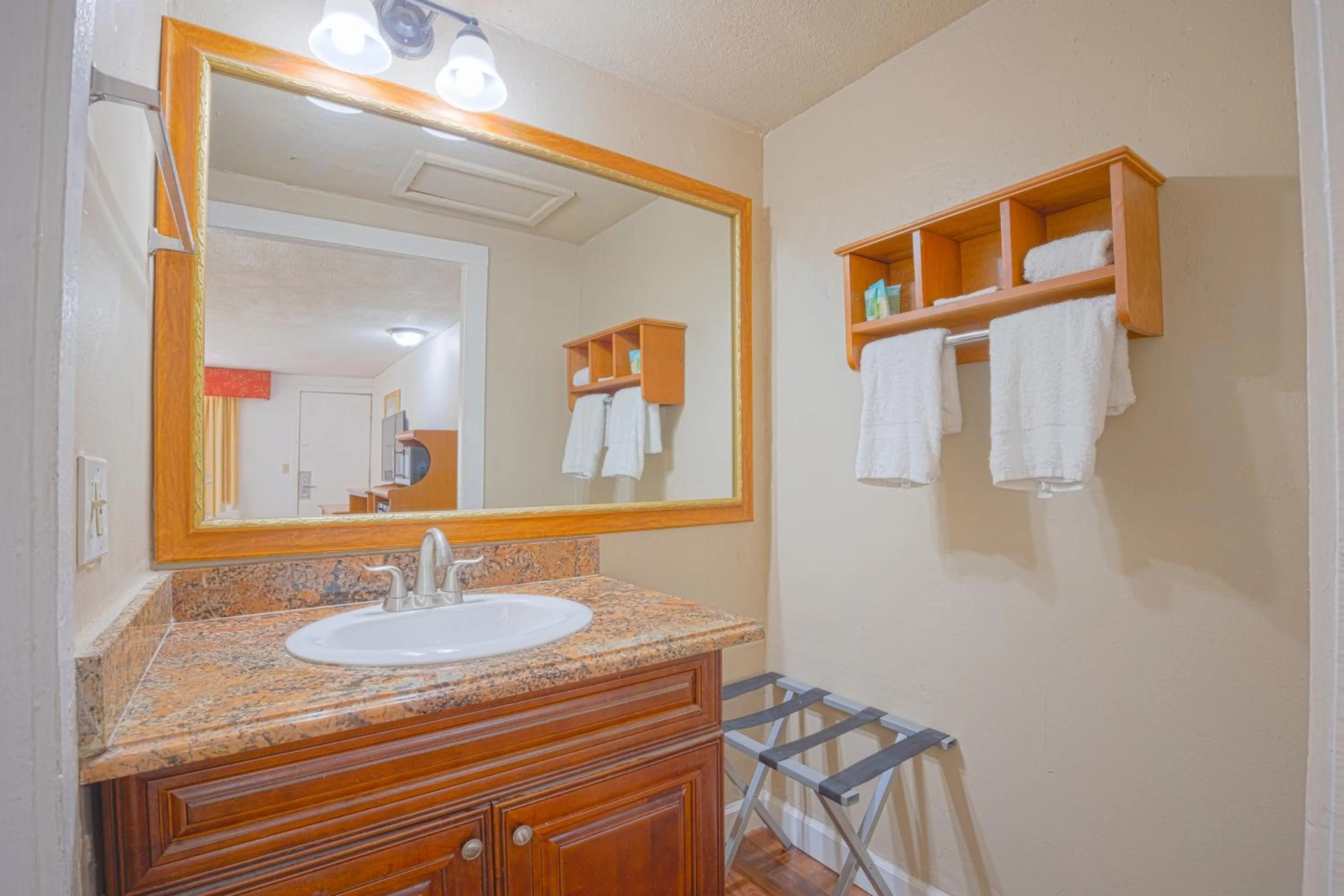 Bathroom in Liberty Garden Inn by OYO Kissimmee near Disney World