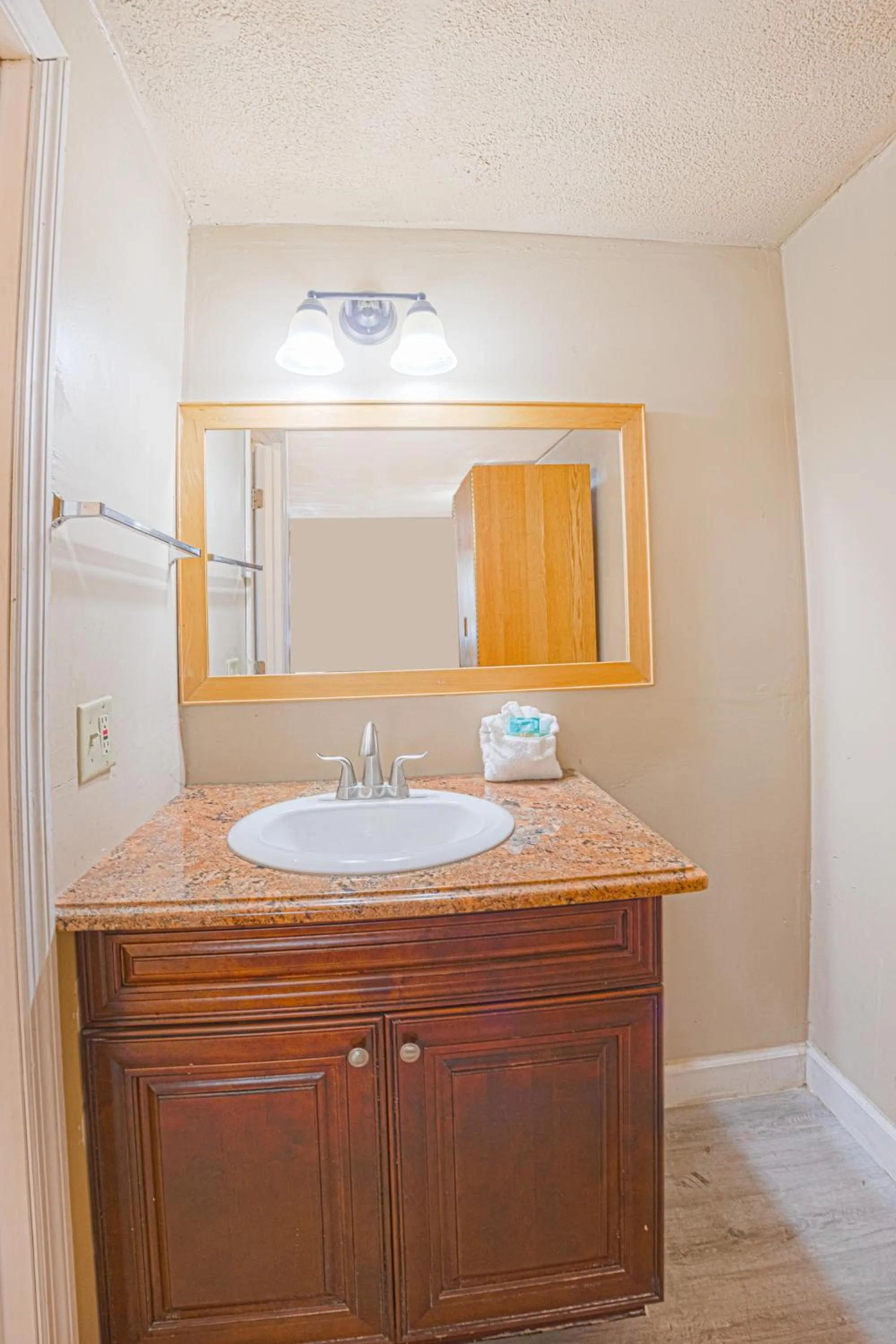 Bathroom in Liberty Garden Inn by OYO Kissimmee near Disney World