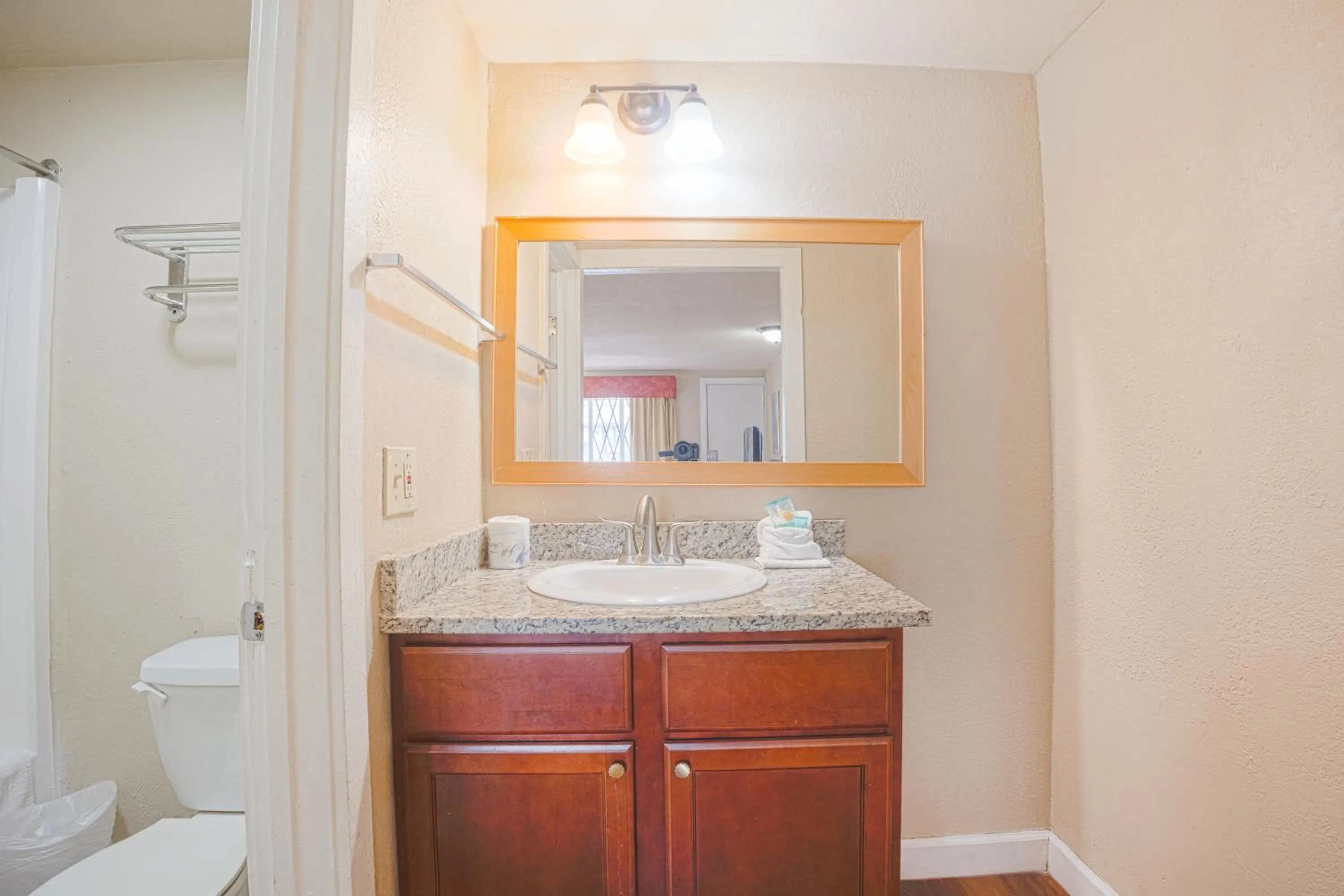 Bathroom in Liberty Garden Inn by OYO Kissimmee near Disney World
