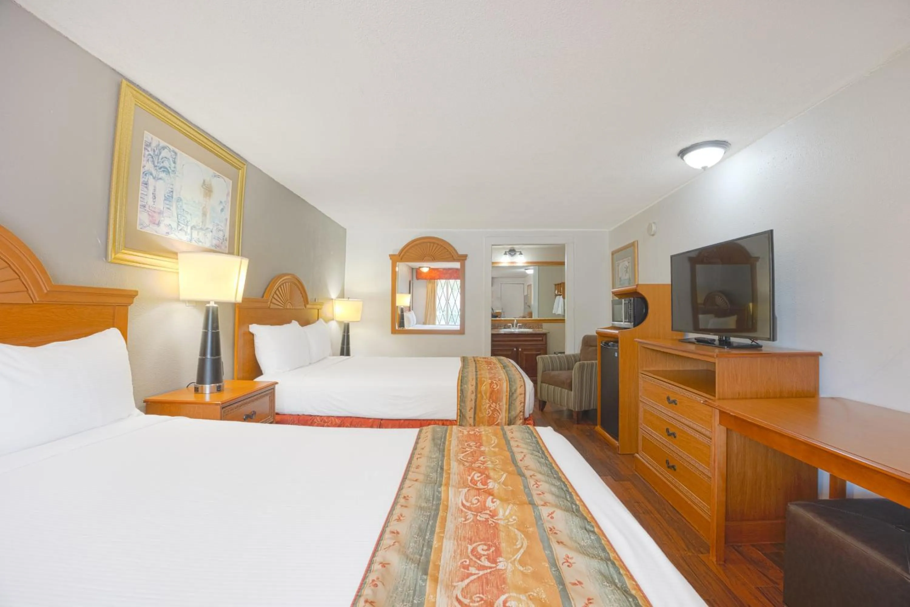 Bedroom, Bed in Liberty Garden Inn by OYO Kissimmee near Disney World