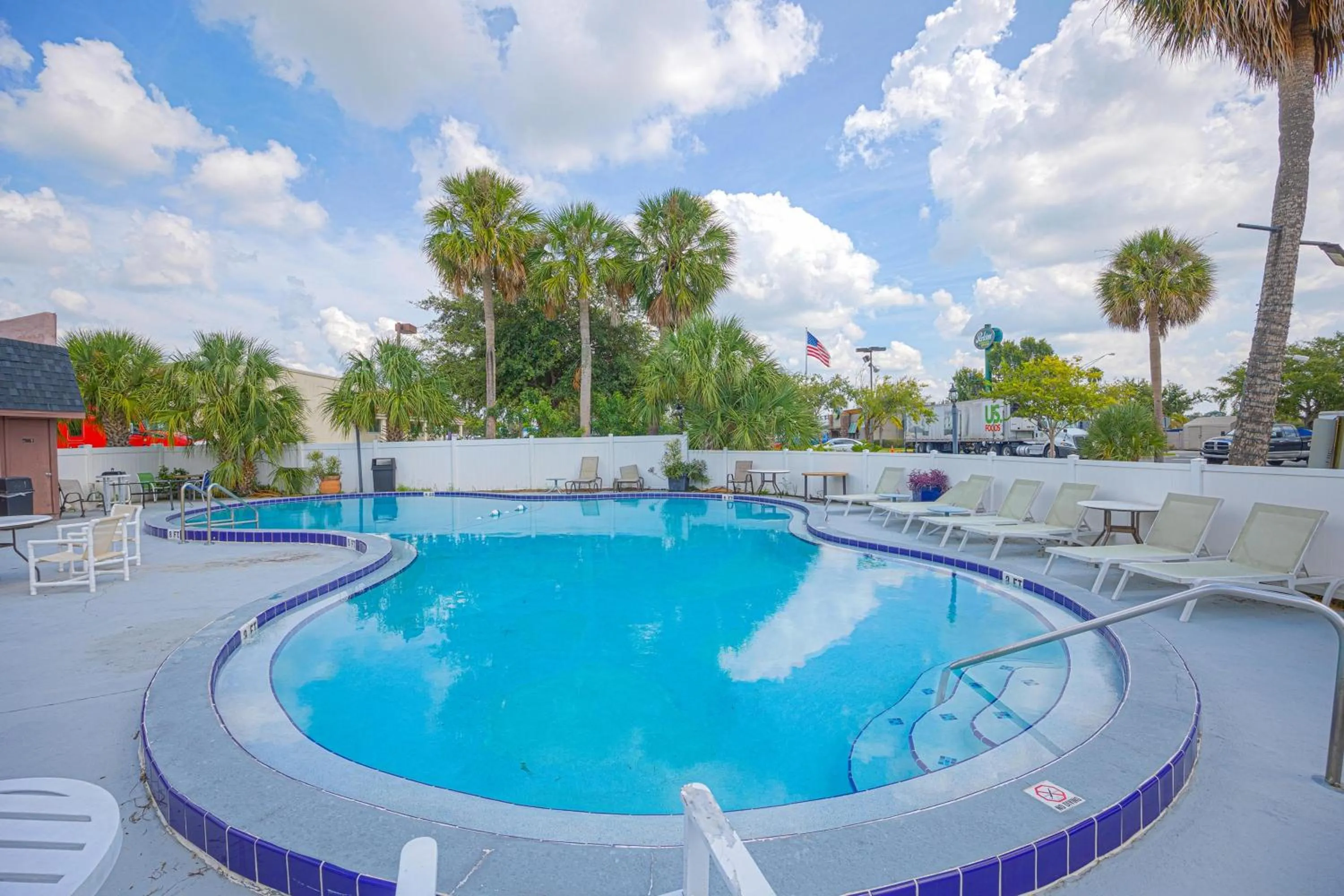 Swimming pool in Liberty Garden Inn by OYO Kissimmee near Disney World