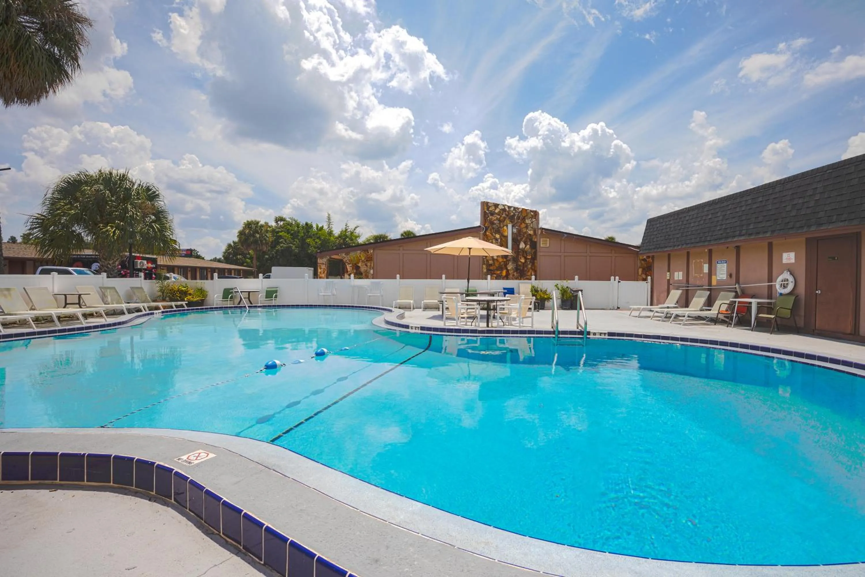 Swimming pool in Liberty Garden Inn by OYO Kissimmee near Disney World