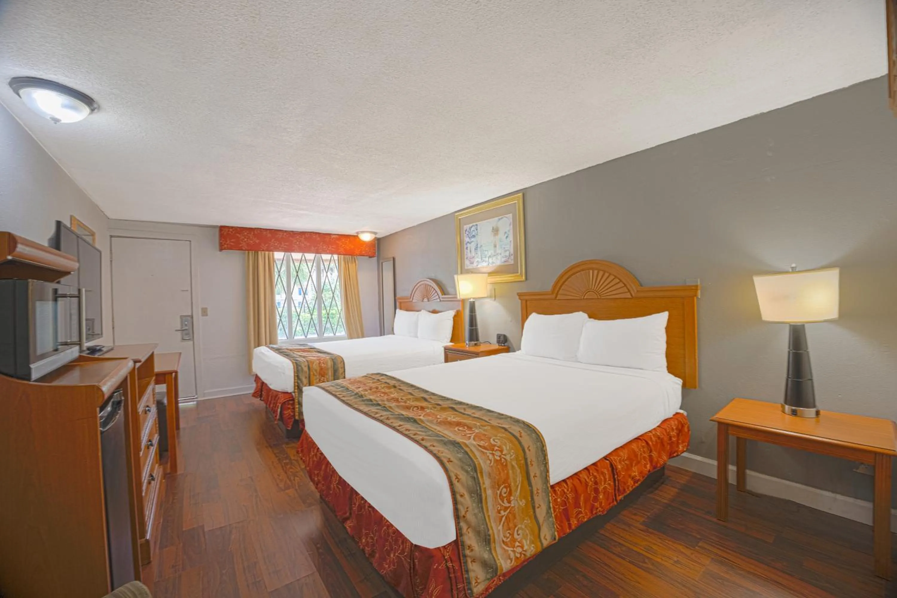 Bedroom, Bed in Liberty Garden Inn by OYO Kissimmee near Disney World