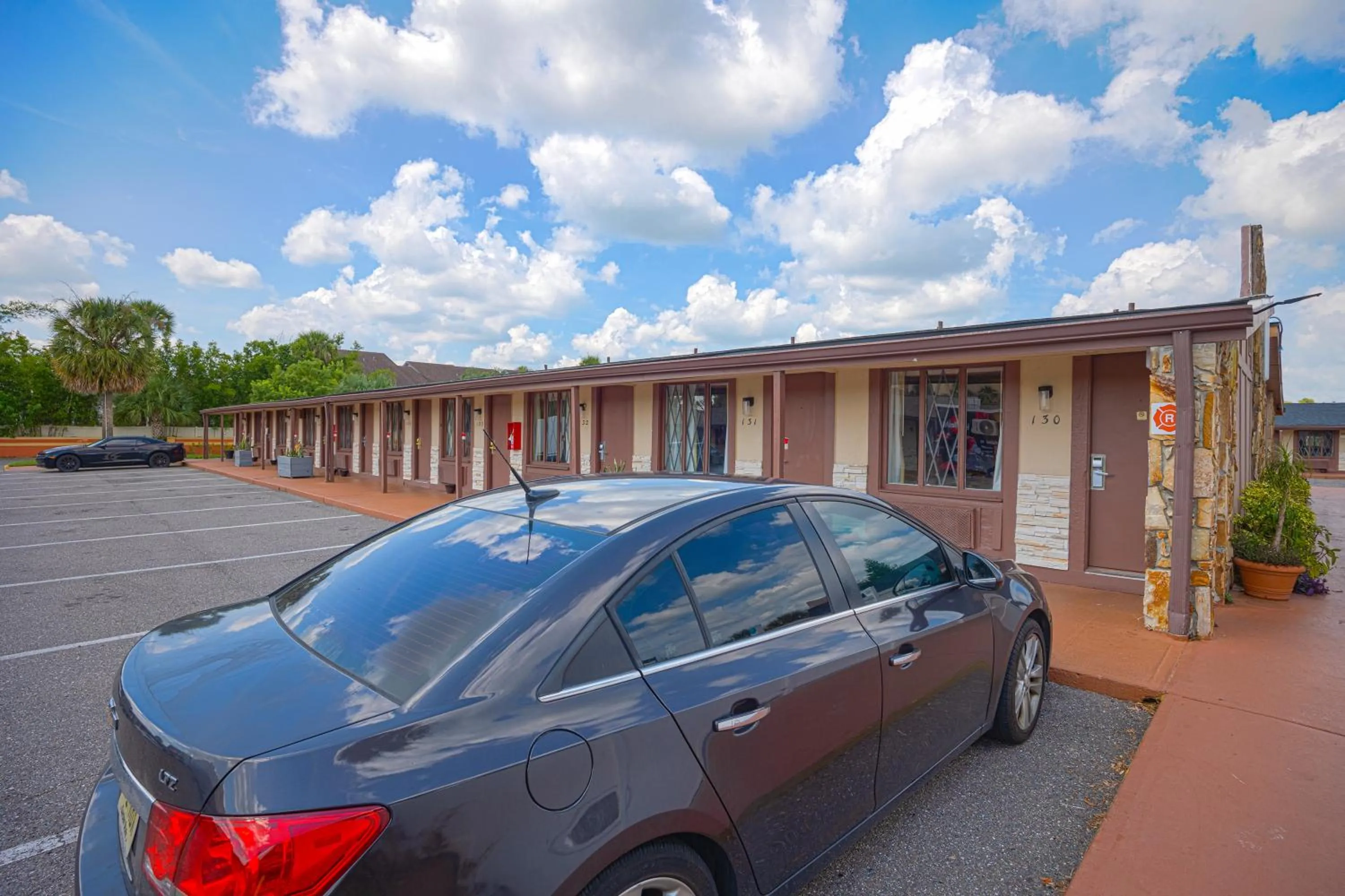 Parking in Liberty Garden Inn by OYO Kissimmee near Disney World