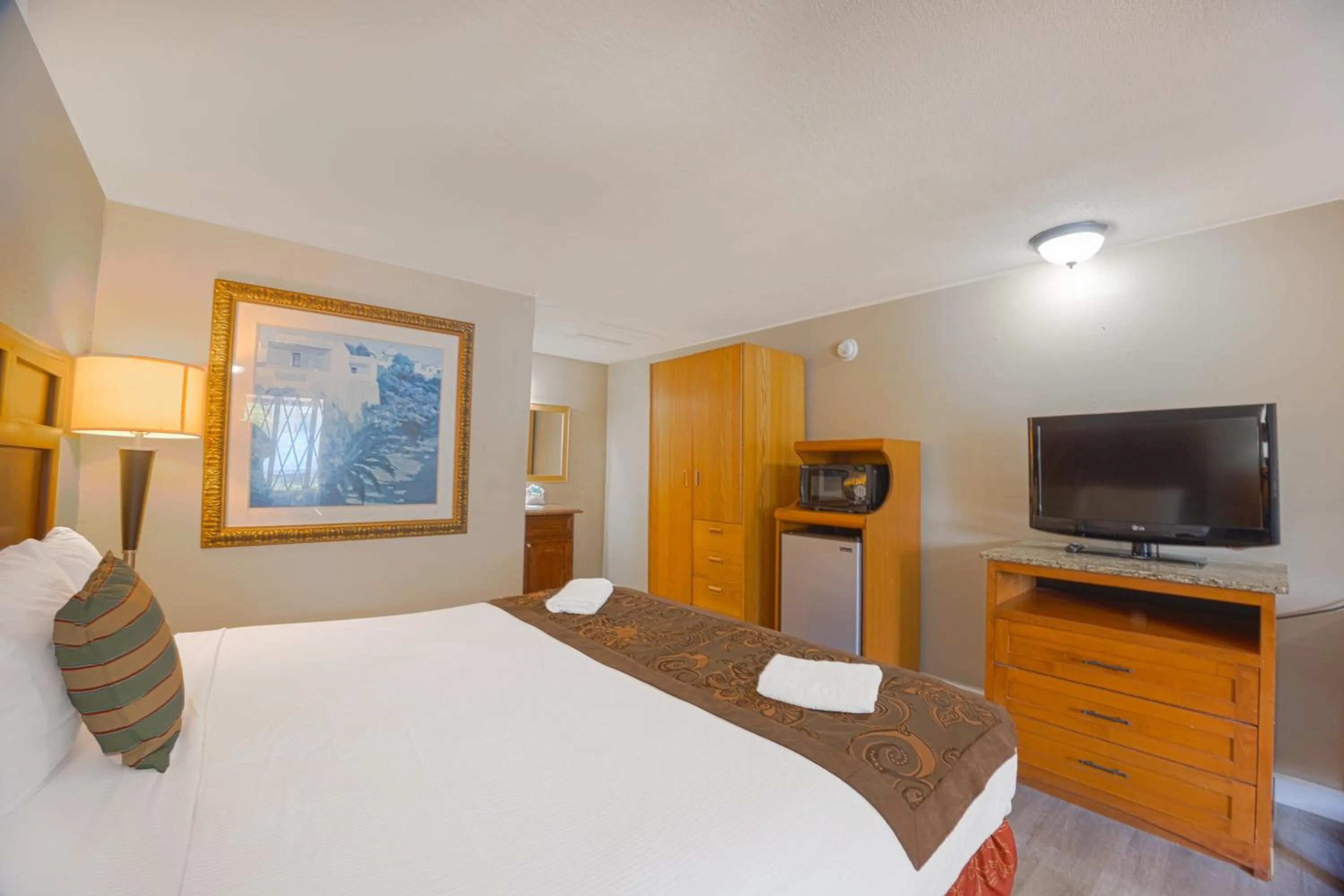 Bedroom, Bed in Liberty Garden Inn by OYO Kissimmee near Disney World