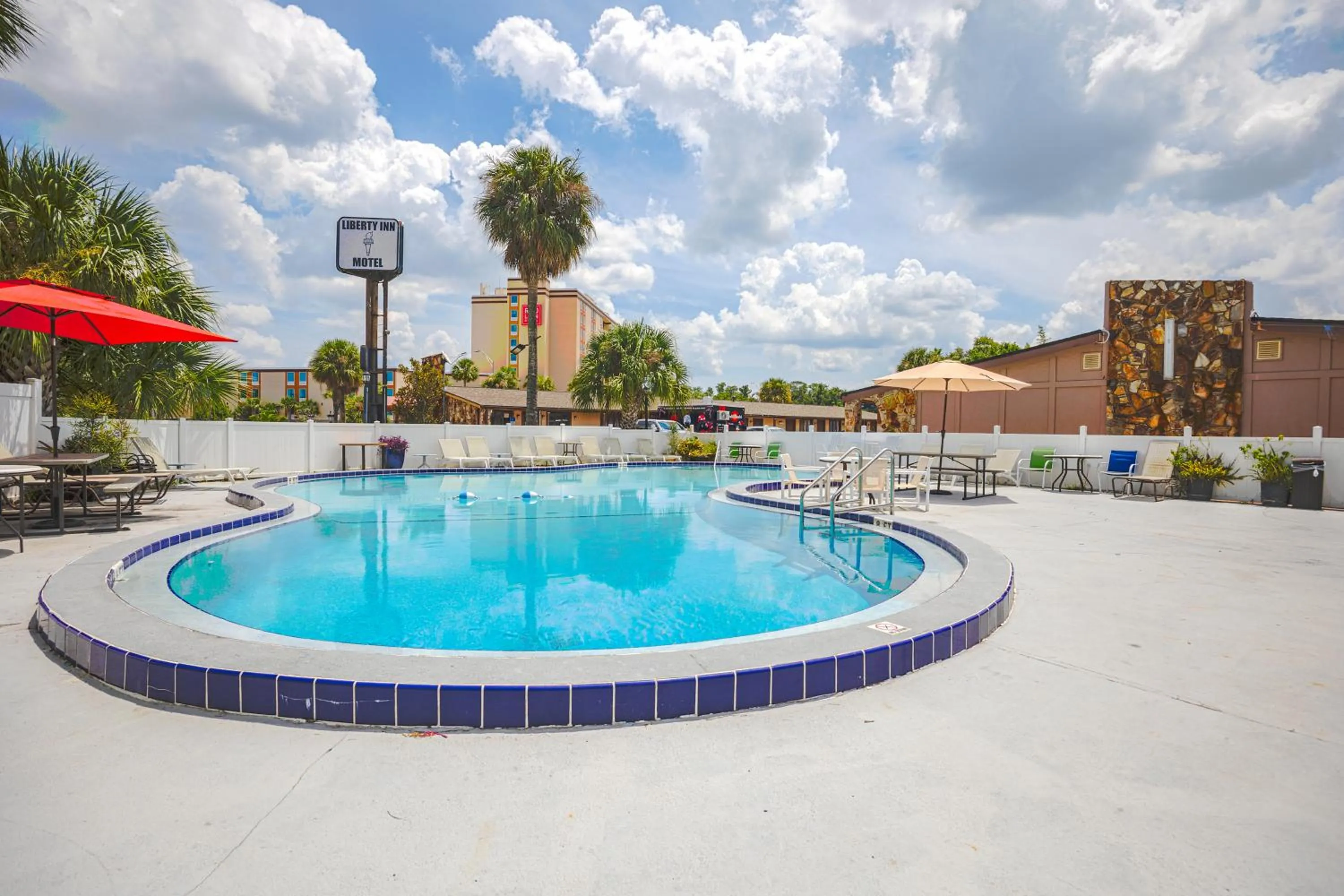 Swimming pool in Liberty Garden Inn by OYO Kissimmee near Disney World