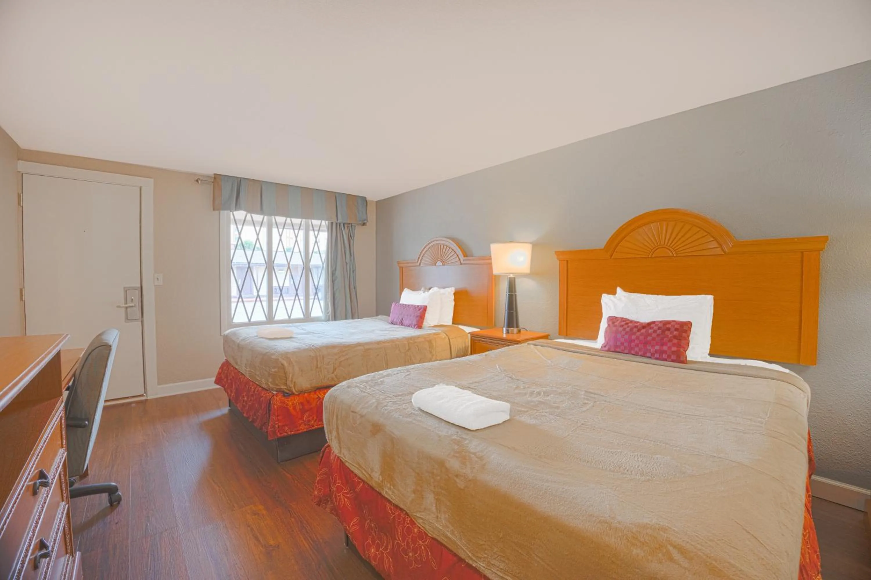 Bedroom, Bed in Liberty Garden Inn by OYO Kissimmee near Disney World