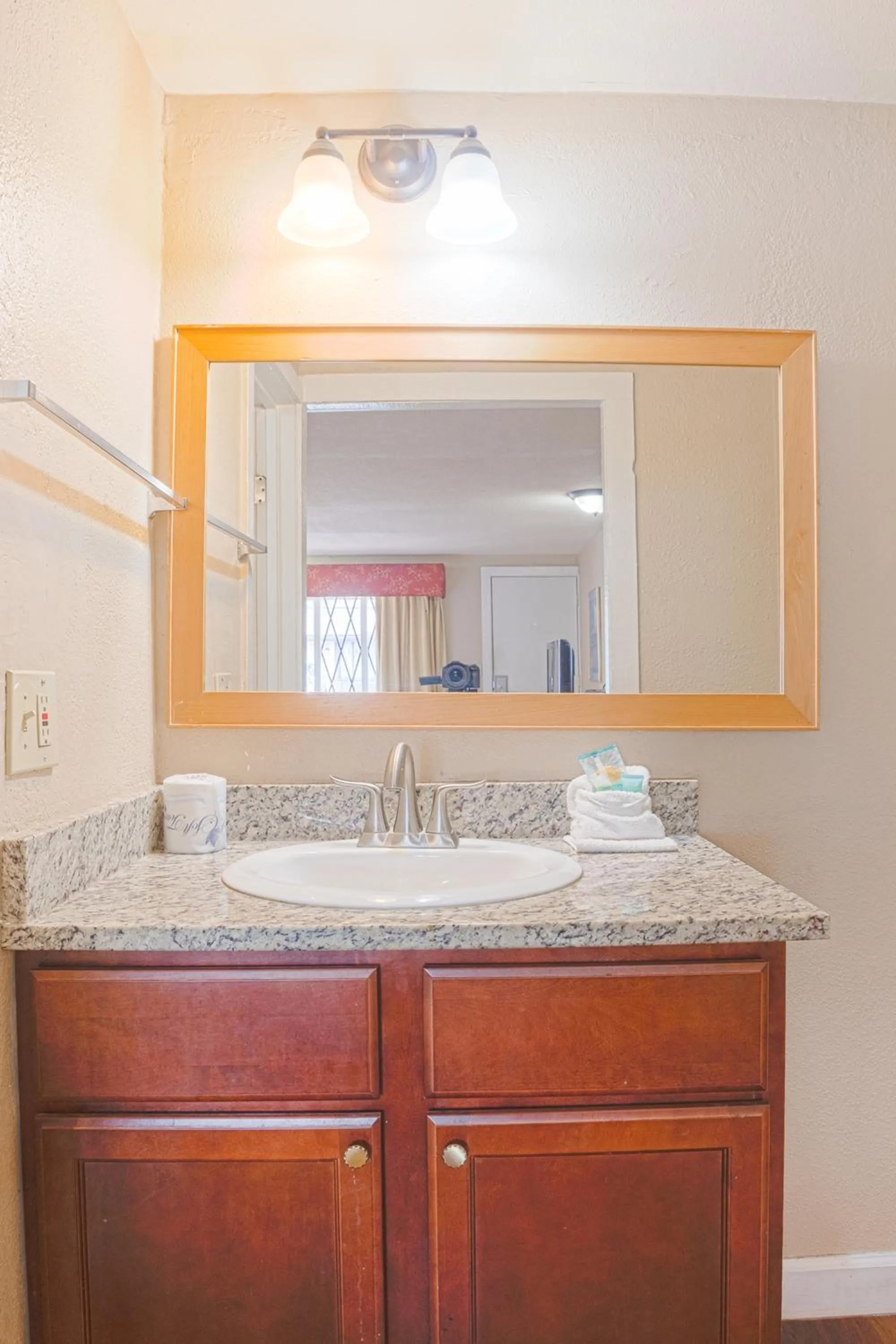 Bathroom in Liberty Garden Inn by OYO Kissimmee near Disney World