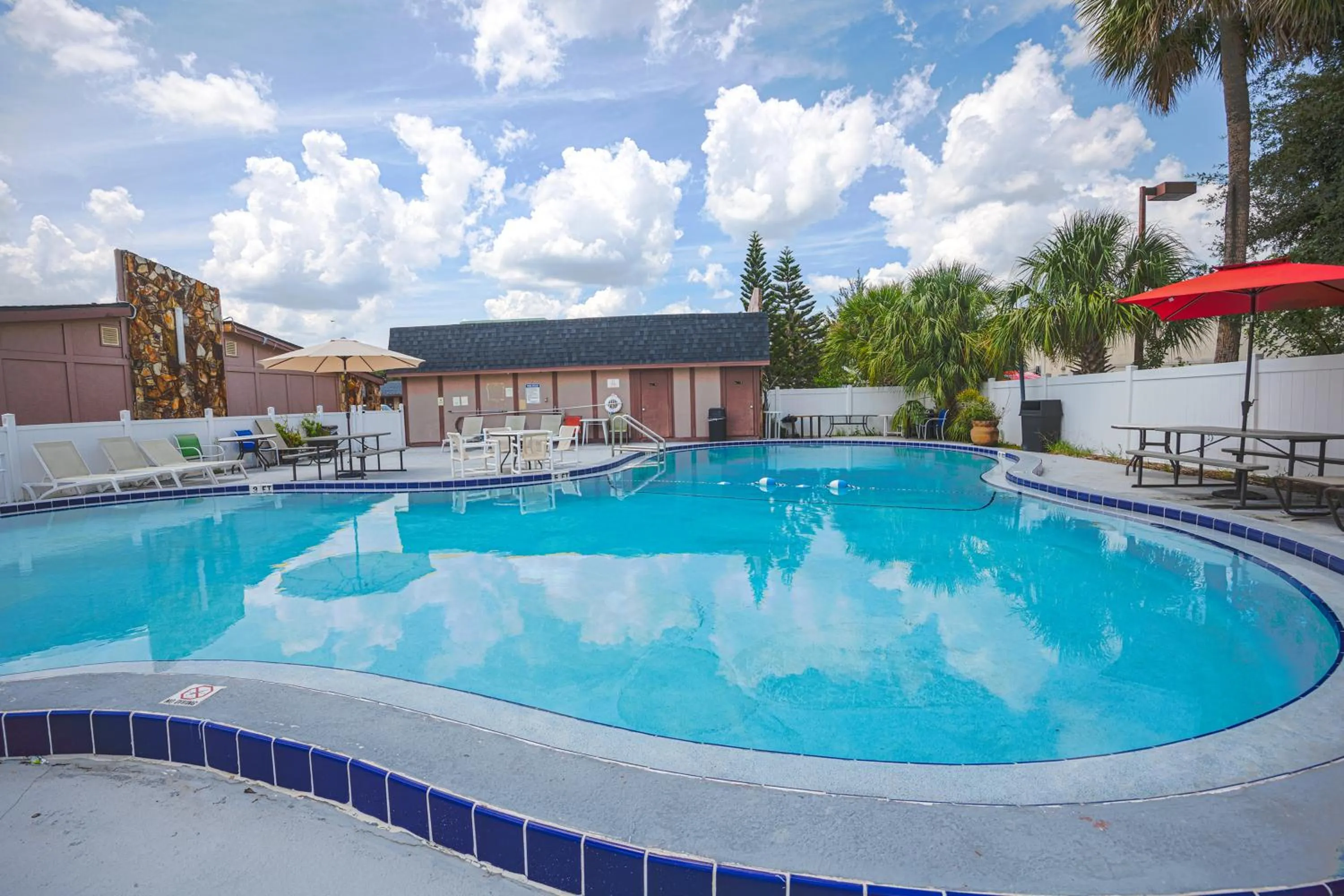Swimming pool in Liberty Garden Inn by OYO Kissimmee near Disney World