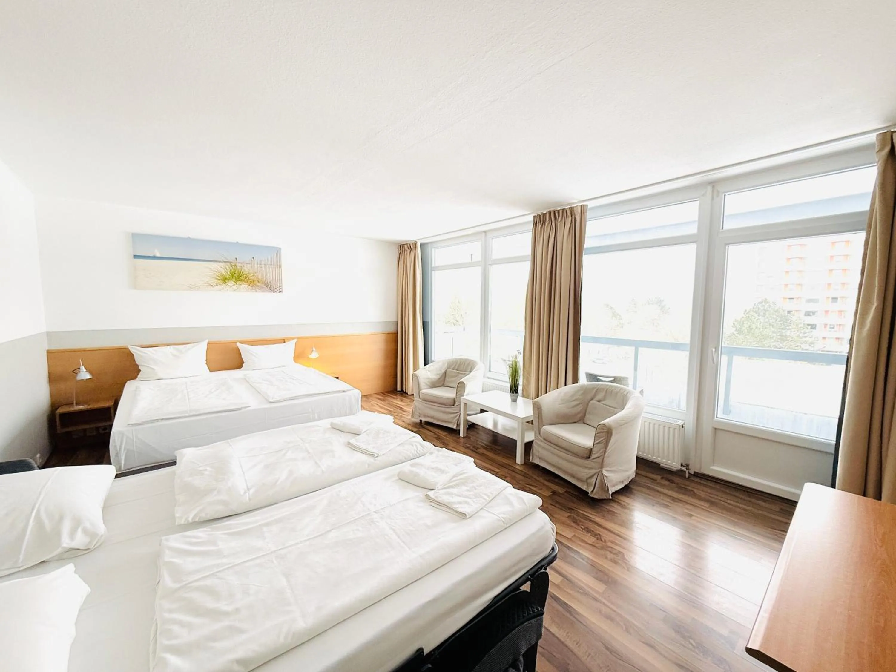 Photo of the whole room, Bed in Hotel Plöner See by Tulip Inn