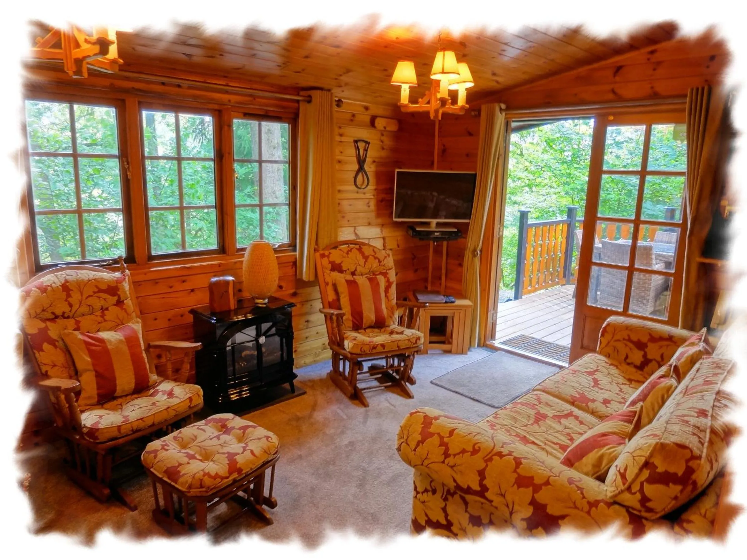 Living room in Blelham Tarn Rustic cabin in tranquil woodland