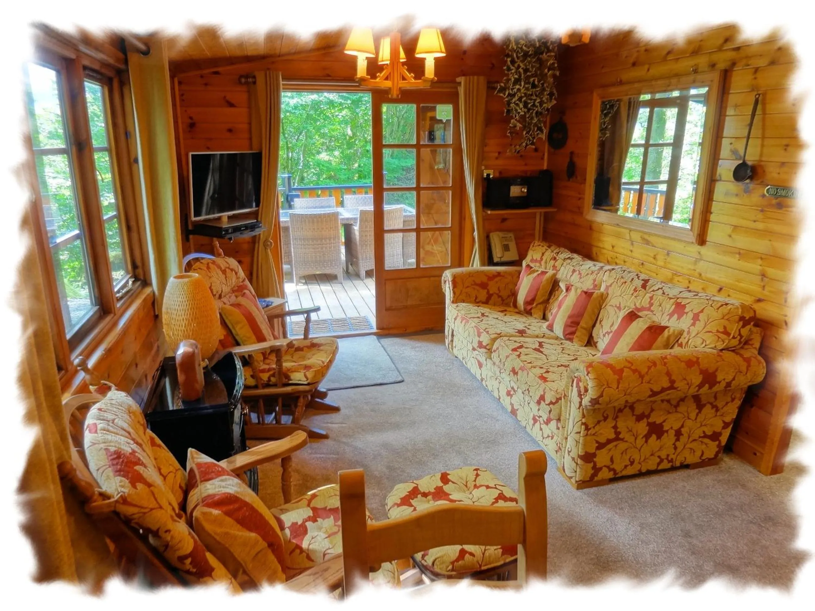 Living room in Blelham Tarn Rustic cabin in tranquil woodland