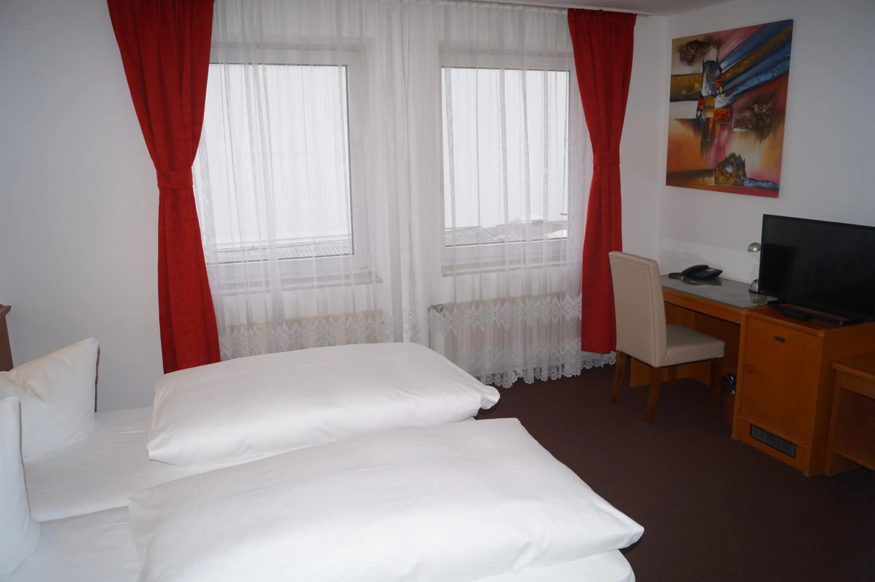 Photo of the whole room, Bed in Hotel Rahlstedter Hof