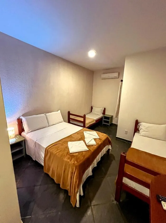 Bed in Pousada Céu de Estrelas