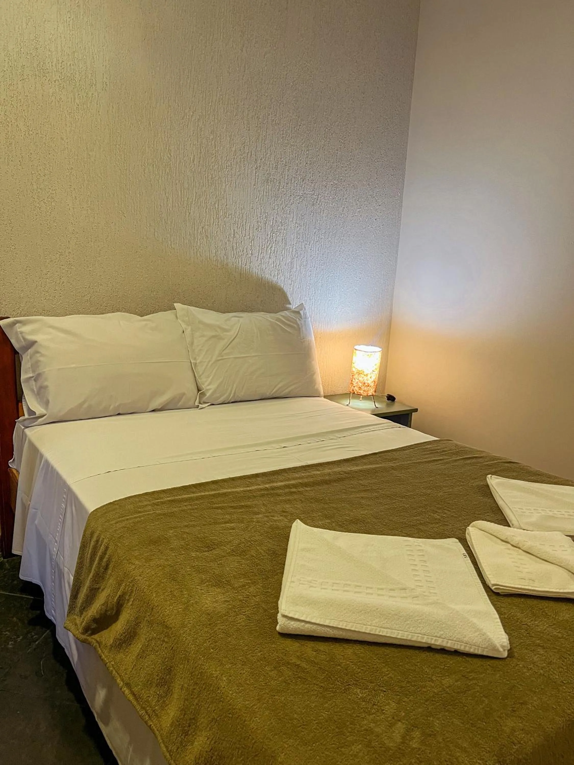 Bed in Pousada Céu de Estrelas