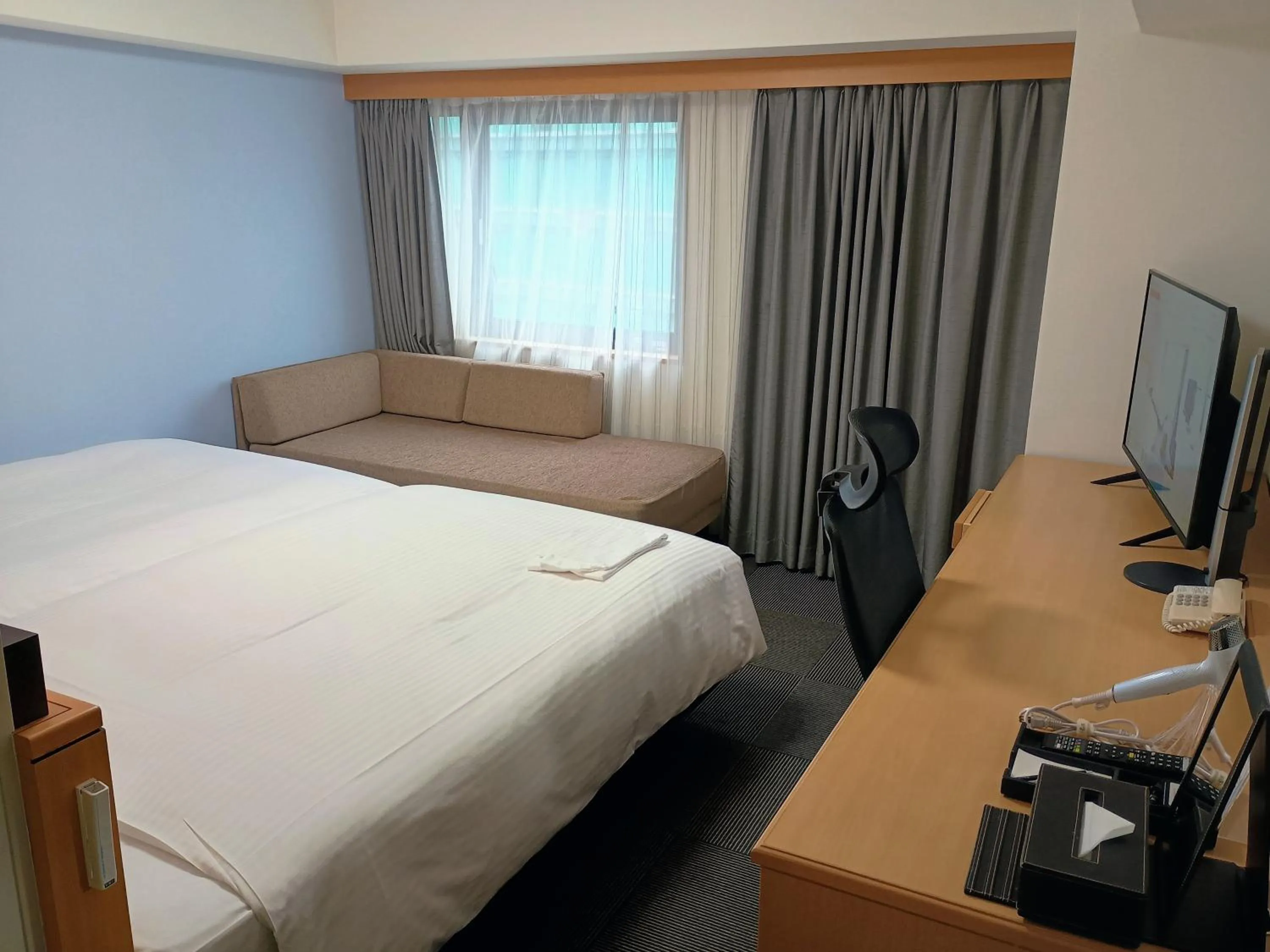 Bed in Richmond Hotel Hakata Ekimae