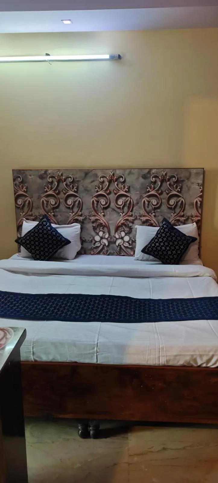 Bed in SSS Group Hotel Dwarka Delhi