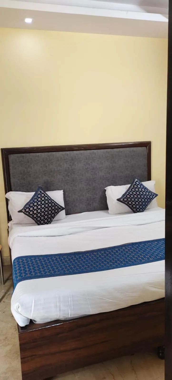 Bed in SSS Group Hotel Dwarka Delhi