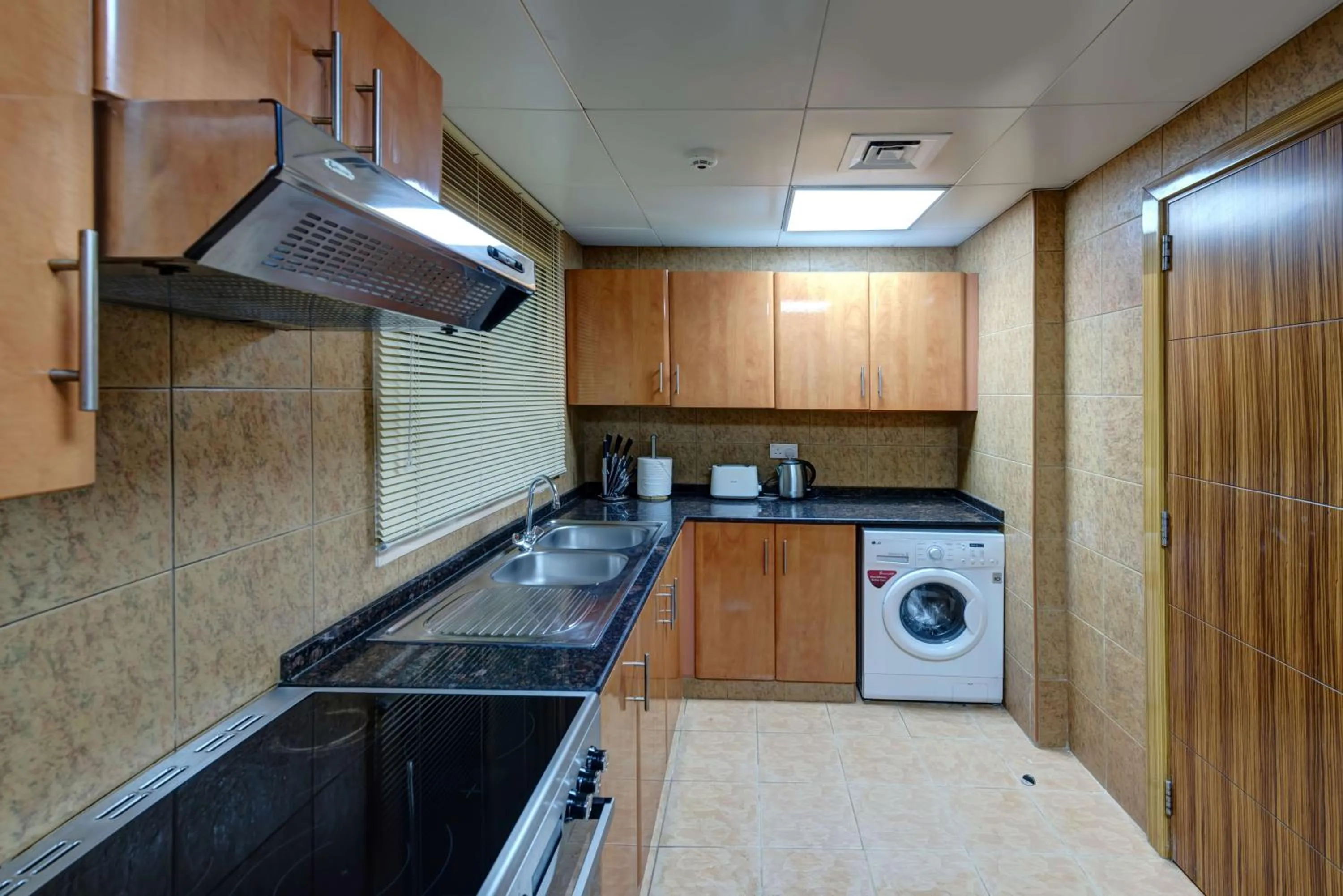 Kitchen or kitchenette in Radiance Premium Suites