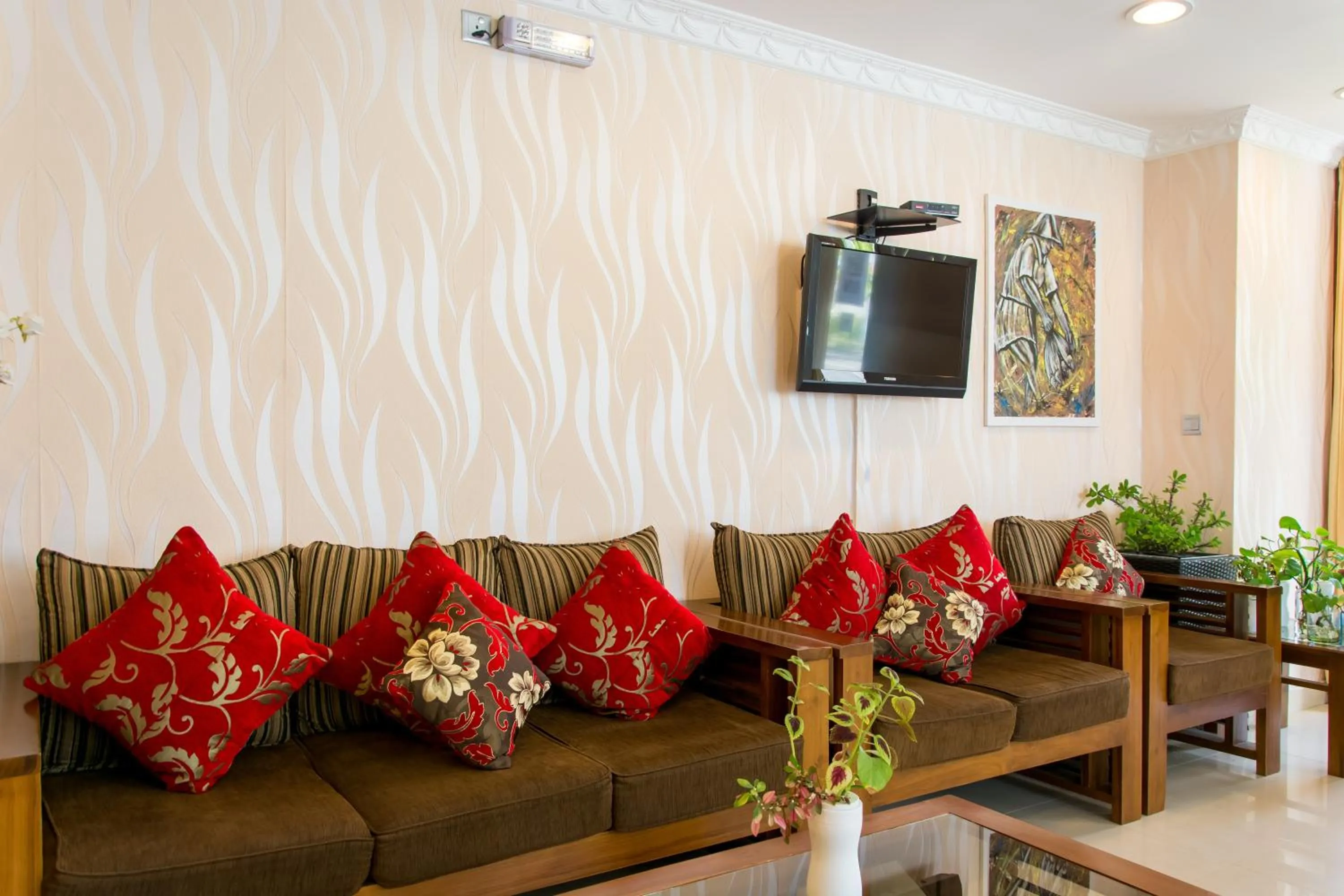 Communal lounge/ TV room in Beach Palace