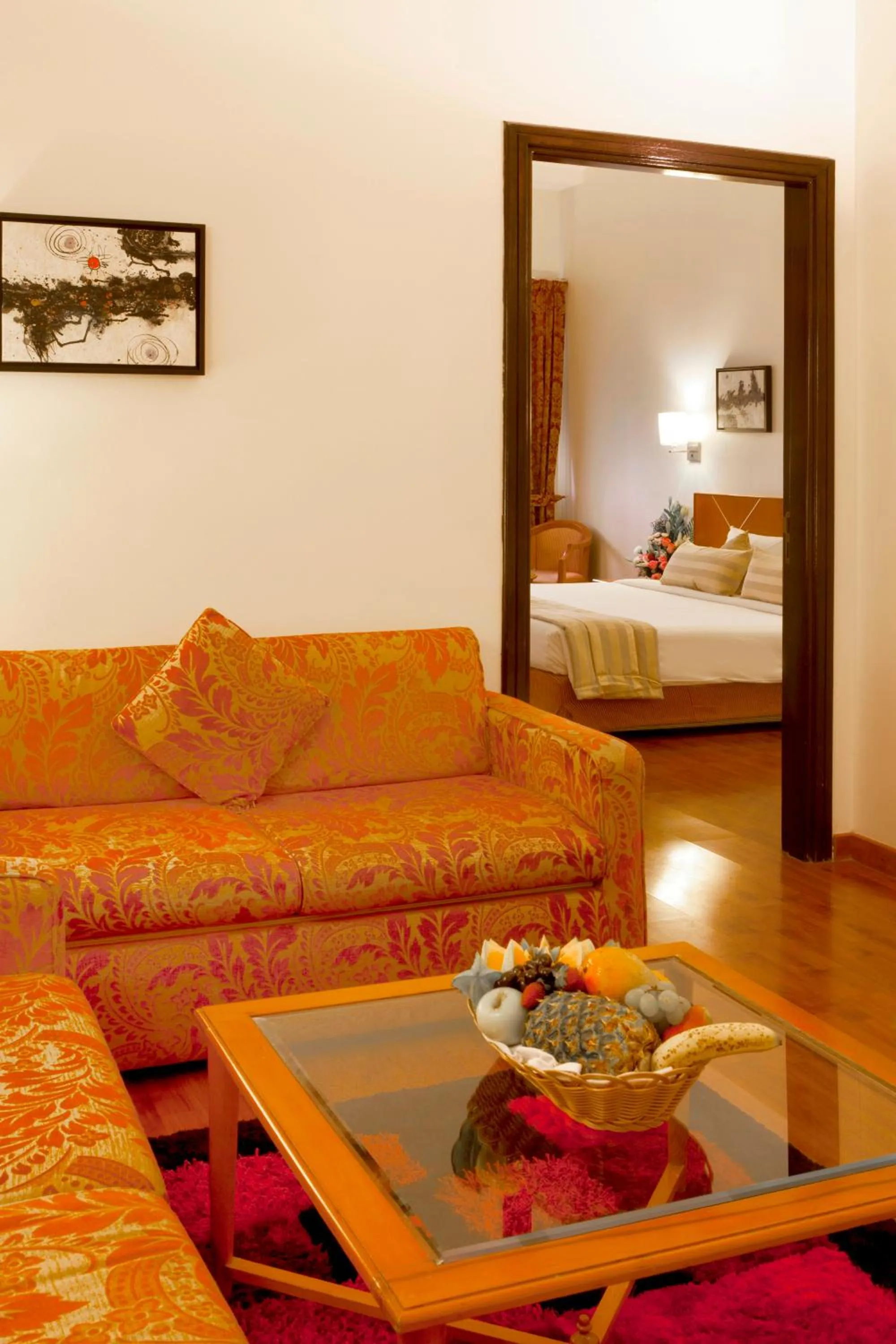 Living room, Bed in Landmark Hotel