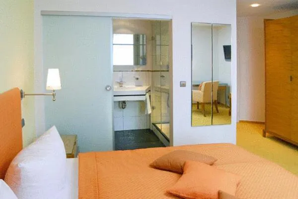 Photo of the whole room, Bed in Restaurant-Hotel Maien