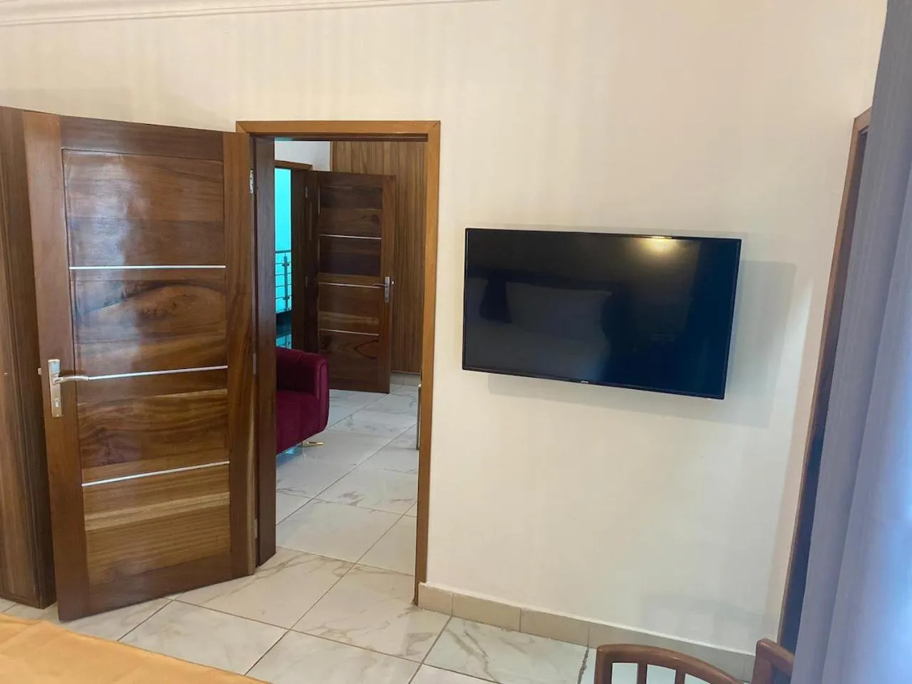 Communal lounge/ TV room in Hotel Residence La Corniche