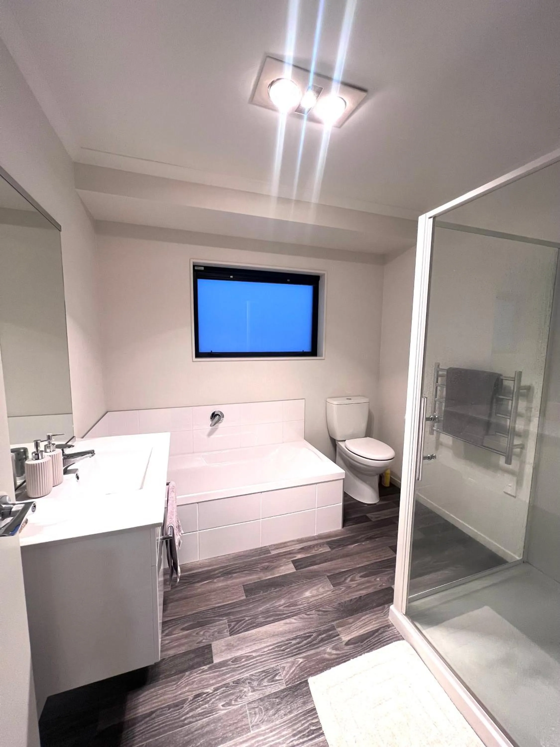 Bathroom, Bed in Mangawhai studio or book a room in Guest's House