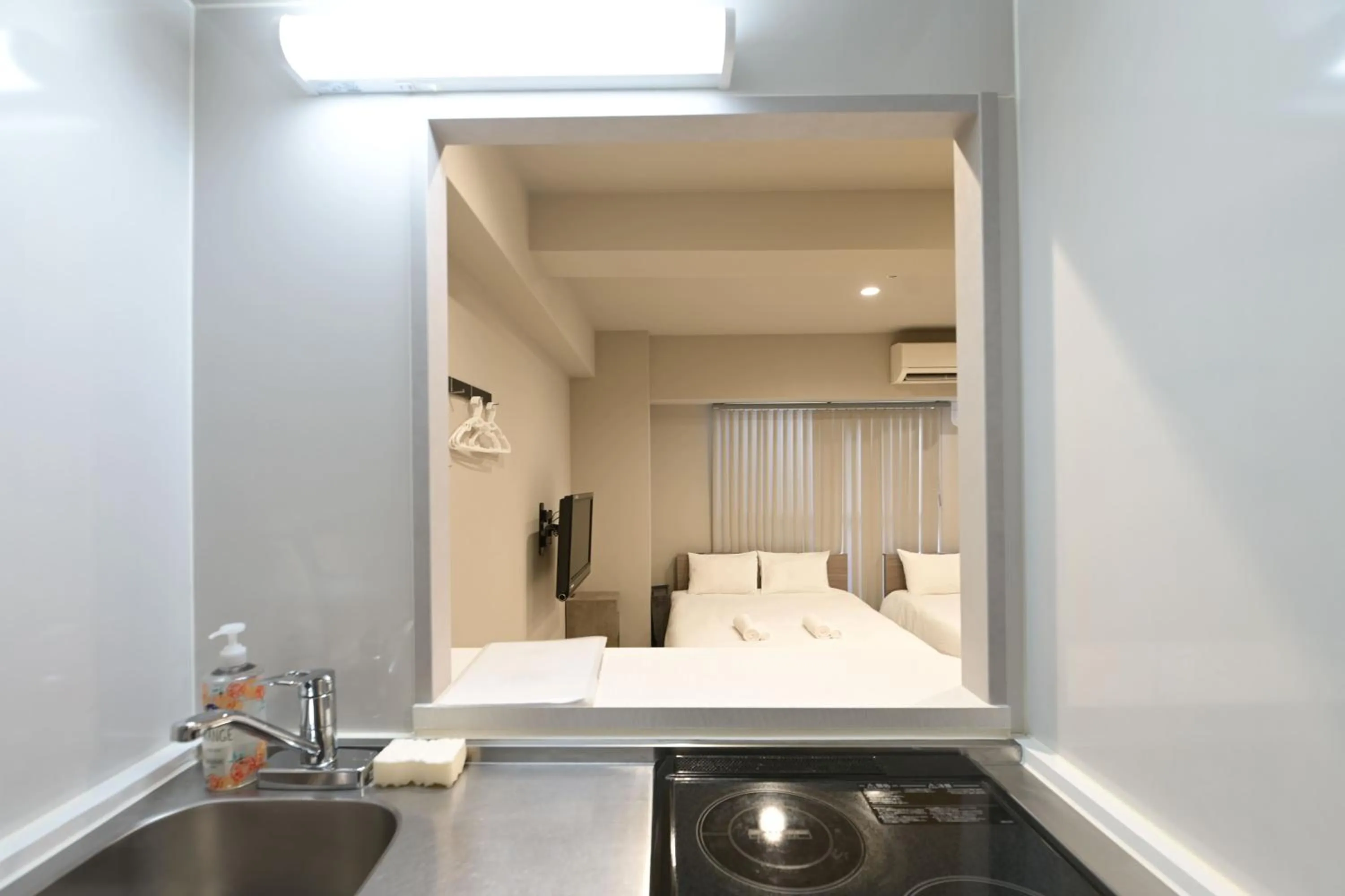 Kitchen or kitchenette in Ostay Kitahama Hotel Apartment