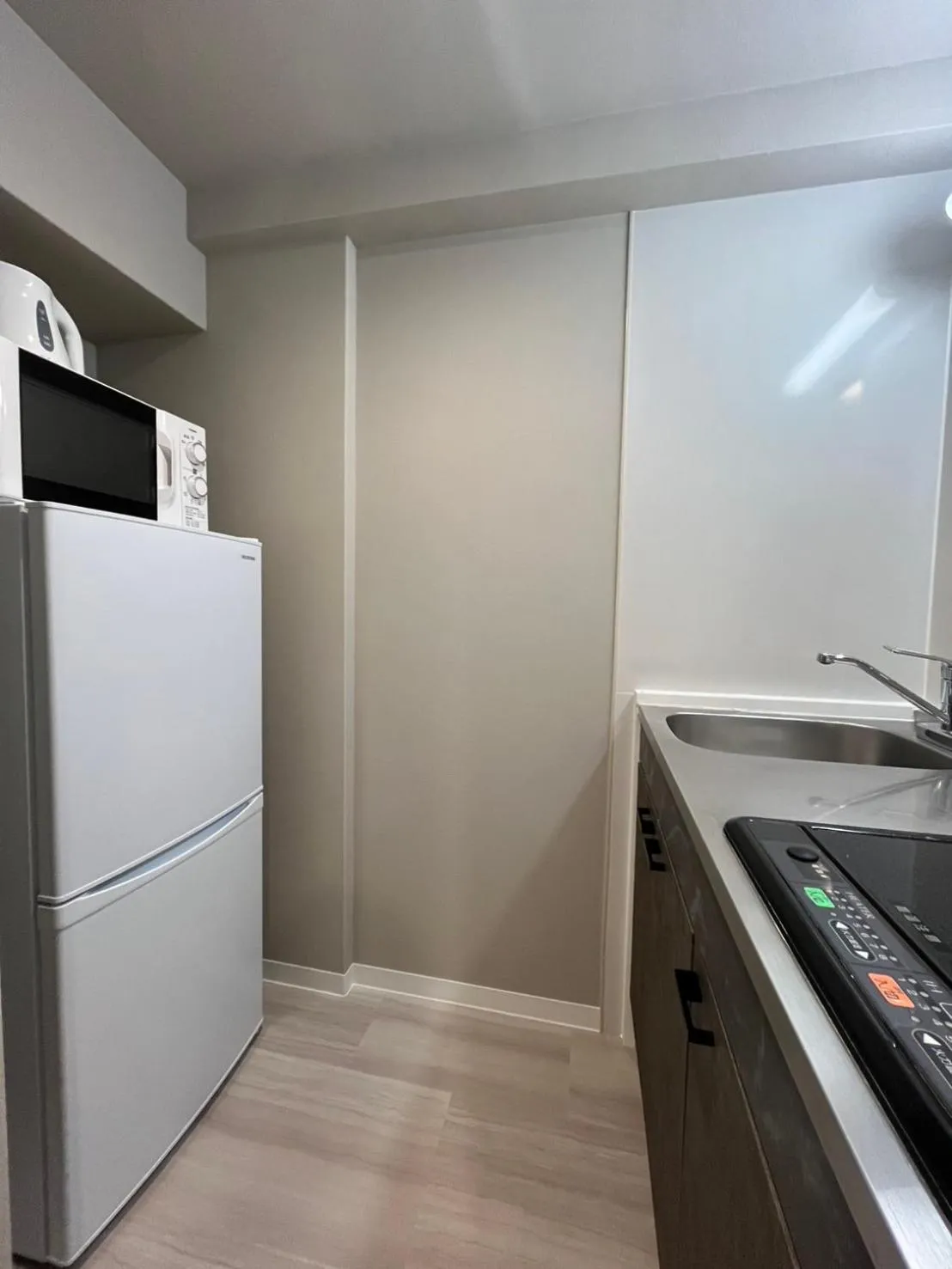 Kitchen or kitchenette in Ostay Kitahama Hotel Apartment