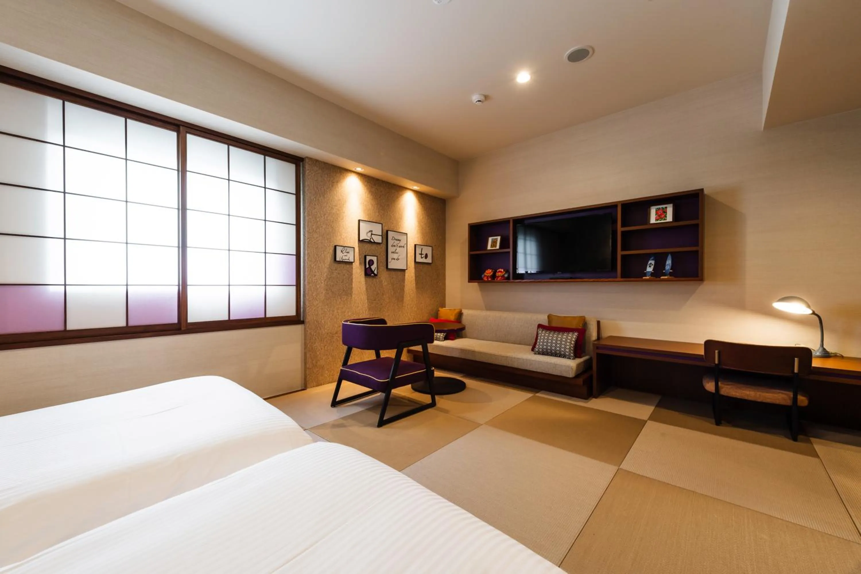 Bed in PROSTYLE RYOKAN Naha Kenchou Mae