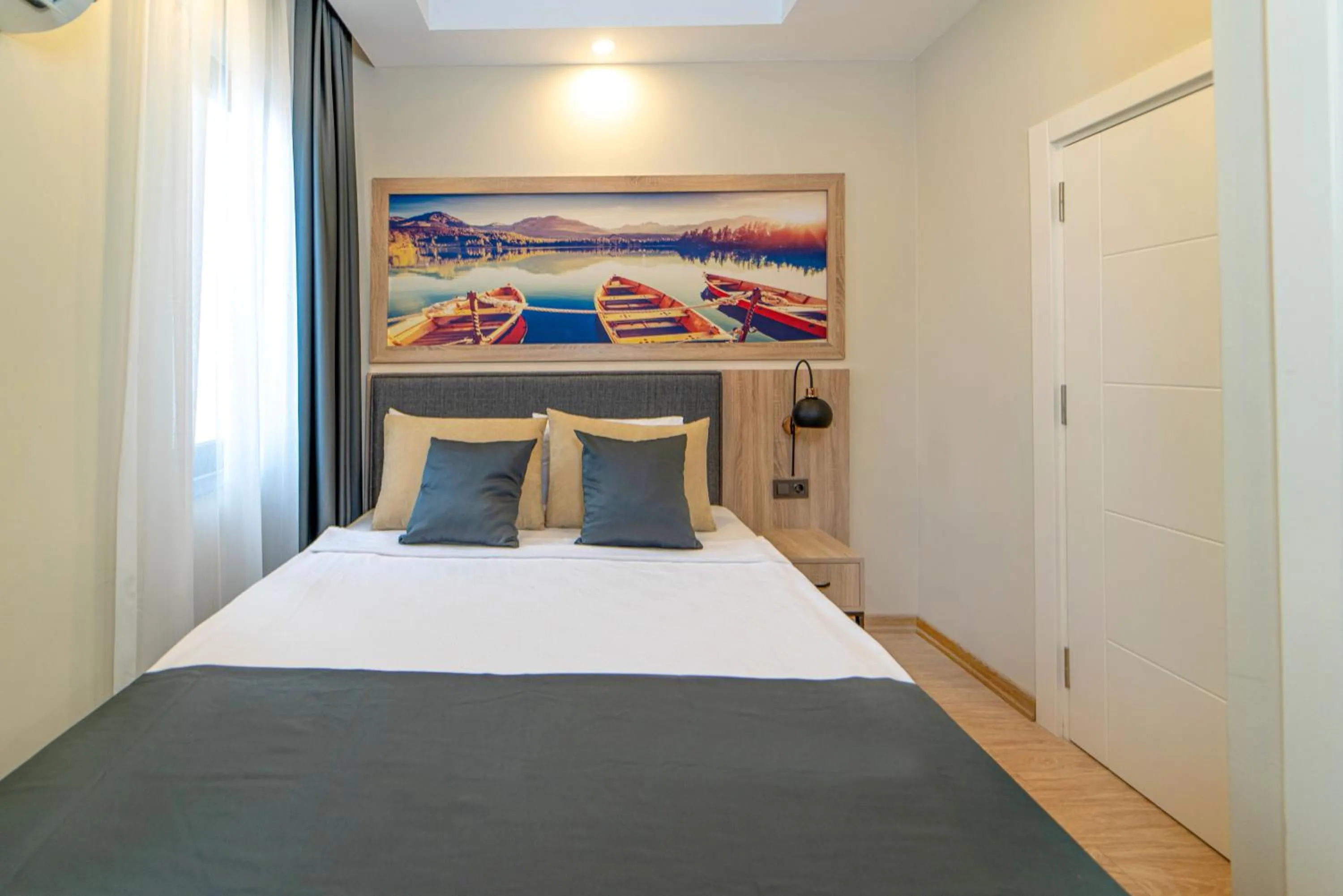 Bed in Deniz Boutique Hotel
