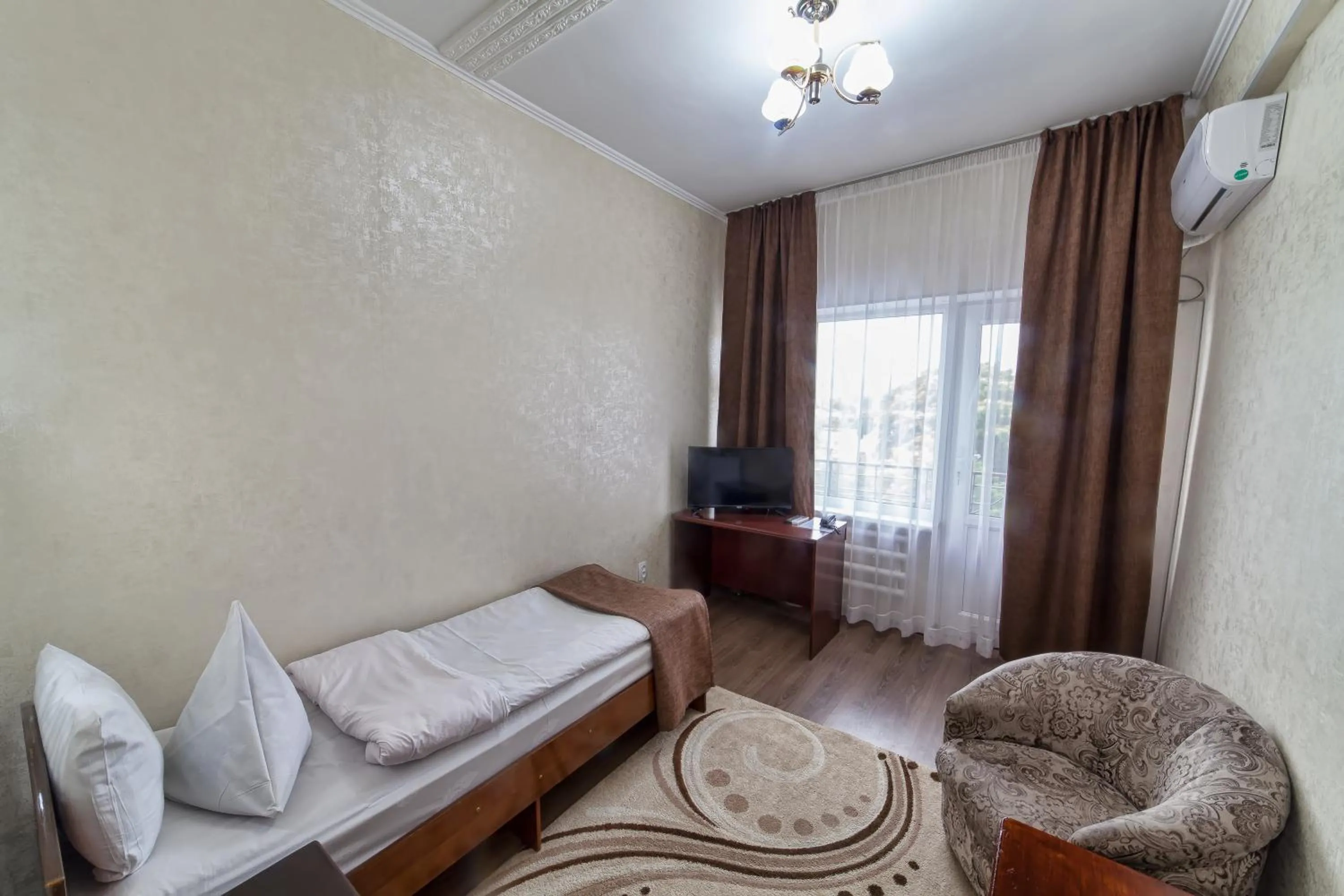 Bathroom, Bed in Hotel Osh-Nuru