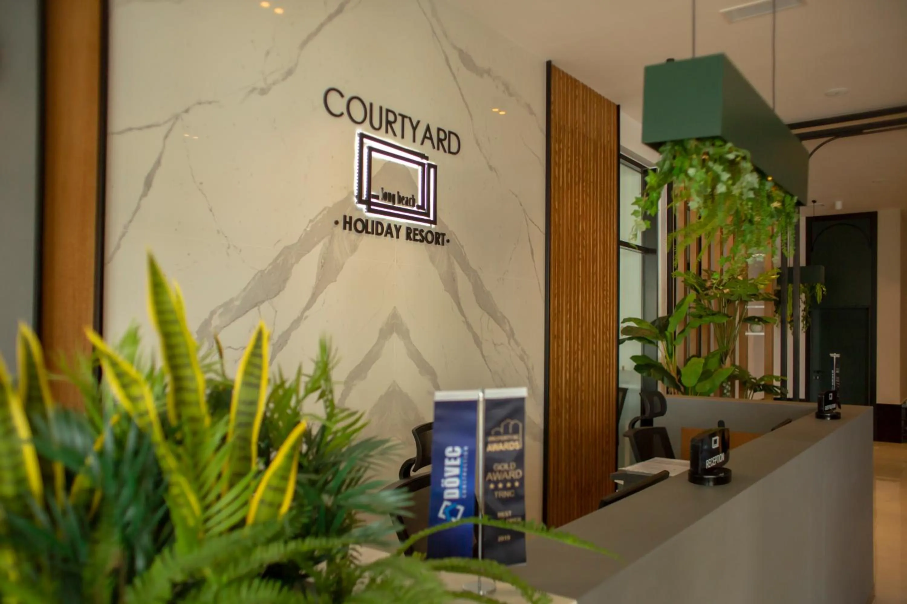 Lobby or reception in Courtyard Long Beach Holiday Resort