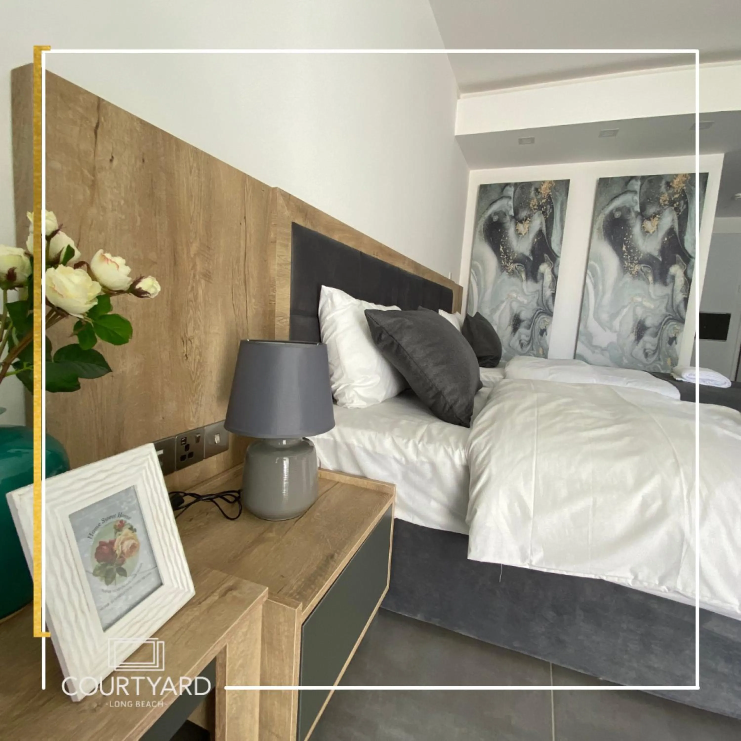 Bed in Courtyard Long Beach Holiday Resort