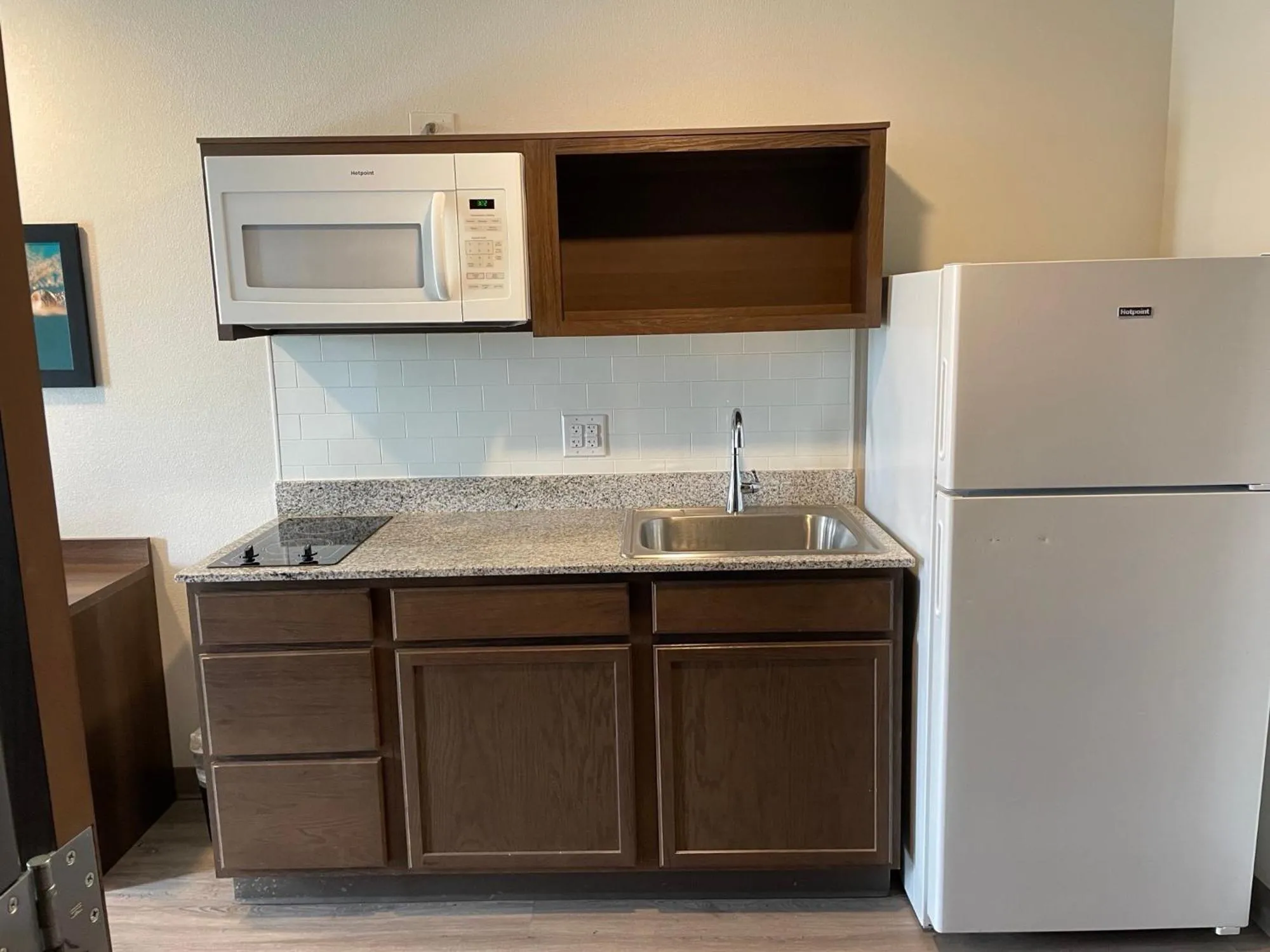 Kitchen or kitchenette in WoodSpring Suites Detroit Madison Heights
