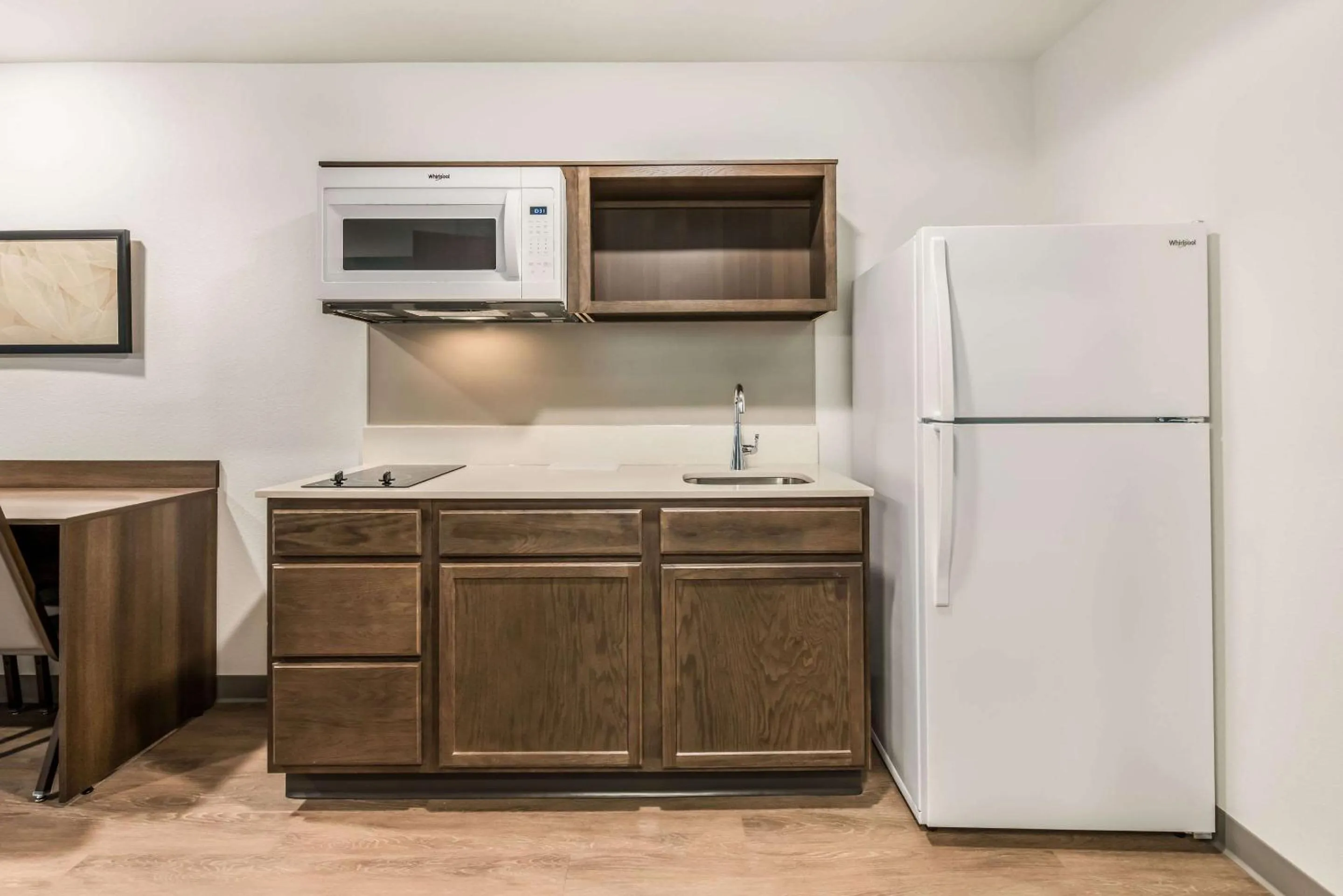 Kitchen or kitchenette in WoodSpring Suites Charlotte - University Research Park