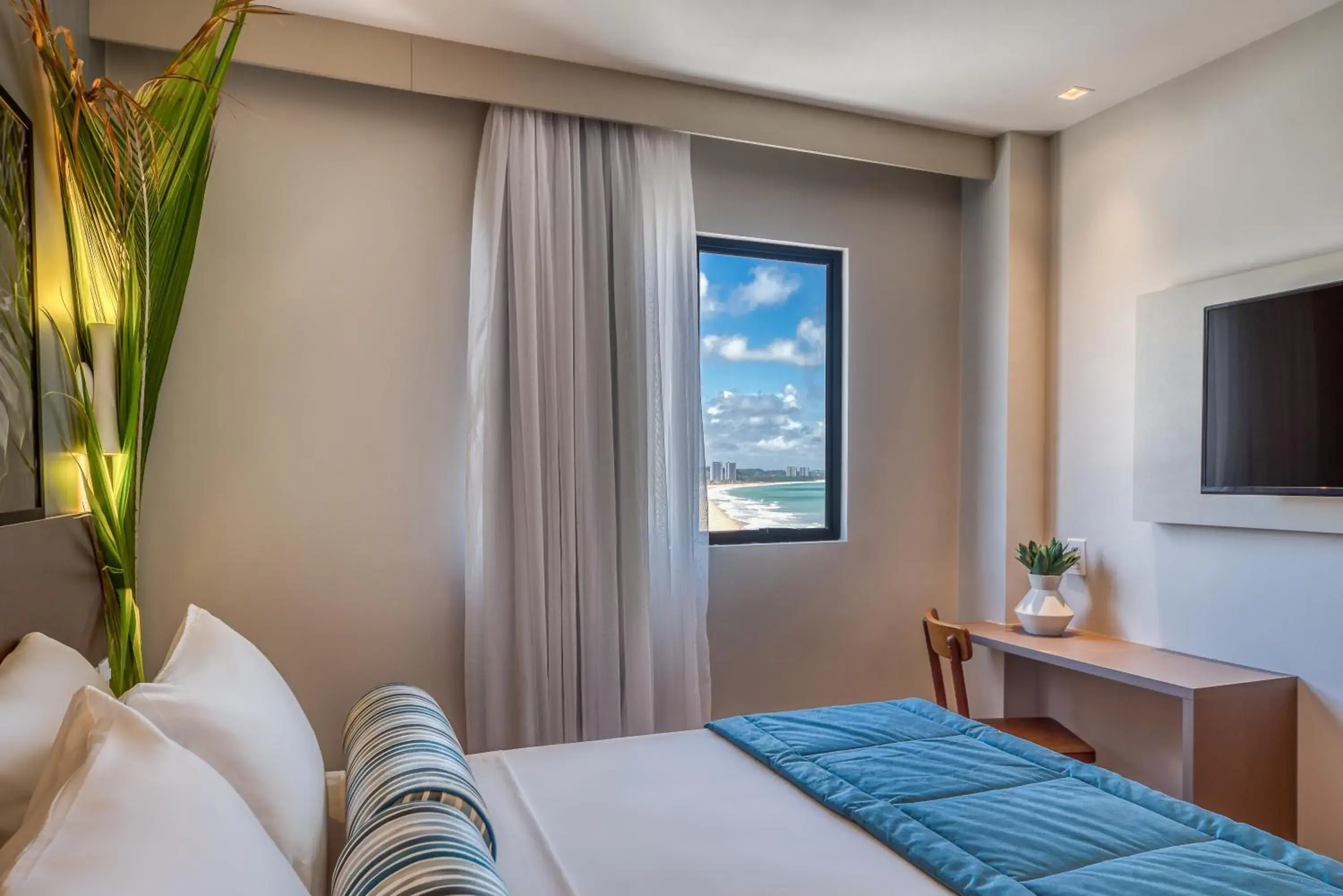 Deluxe Double Room with Side Sea View in Hotel Água de Coco Deluxe Double Room with Side Sea View in Hotel Água de Coco