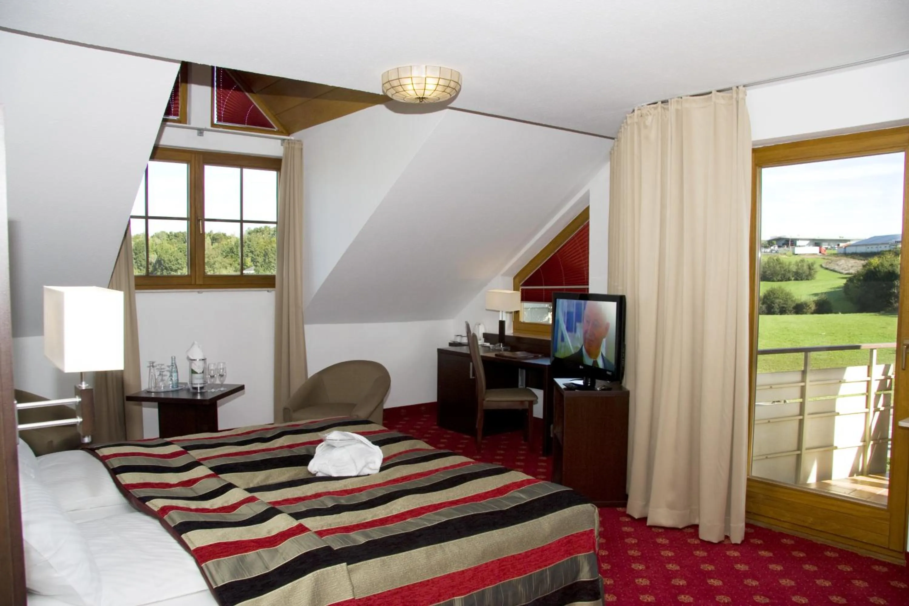 Photo of the whole room, Bed in Hotel Empfinger Hof, Sure Hotel Collection by Best Western