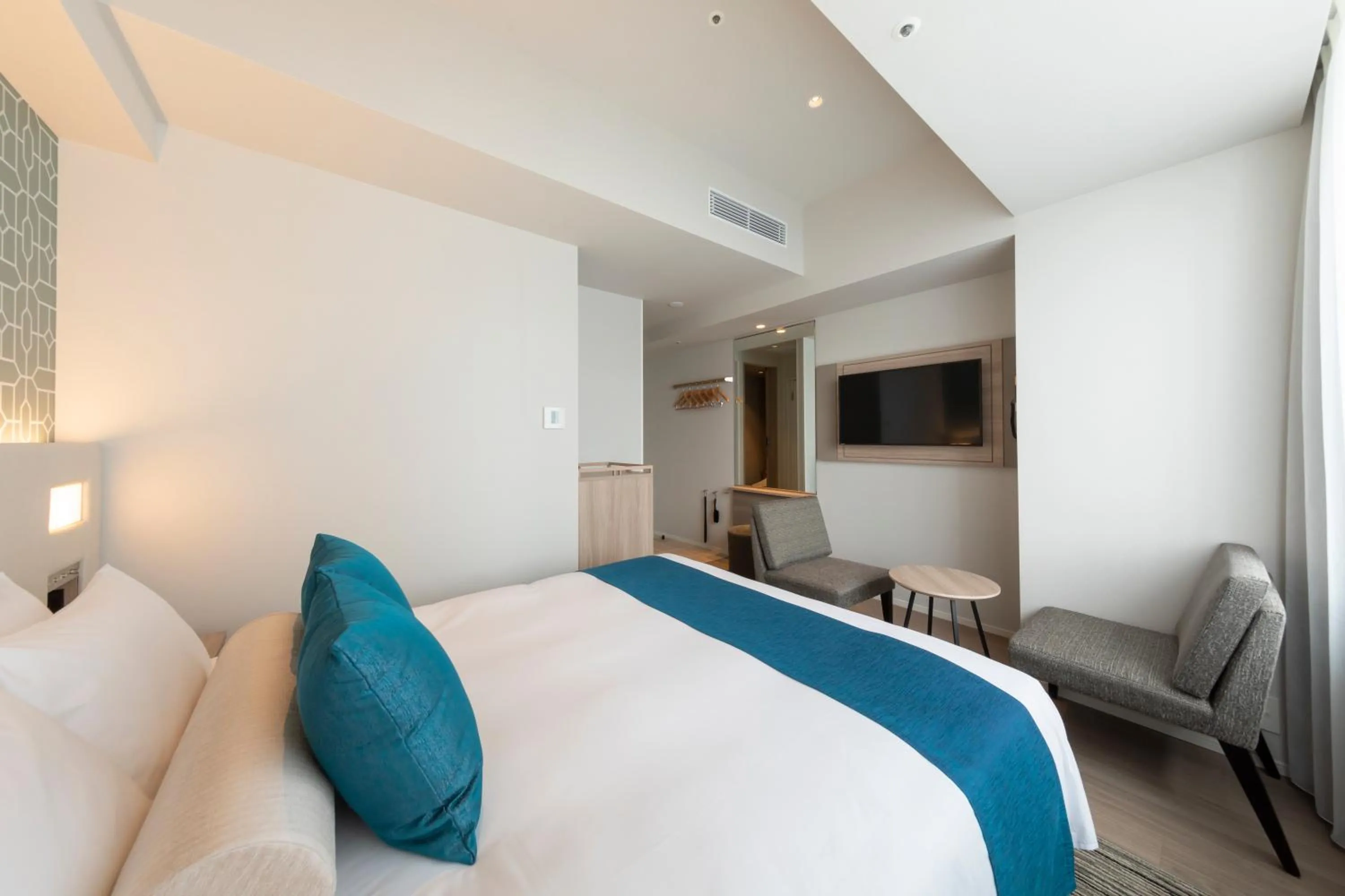 Photo of the whole room, Bed in Hewitt Resort Naha