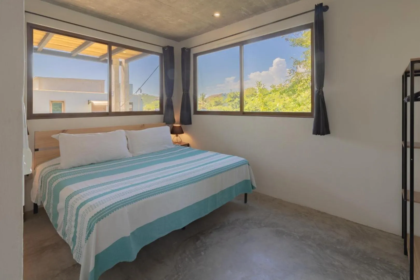 Bed in Casa Mauna Boutique Hotel