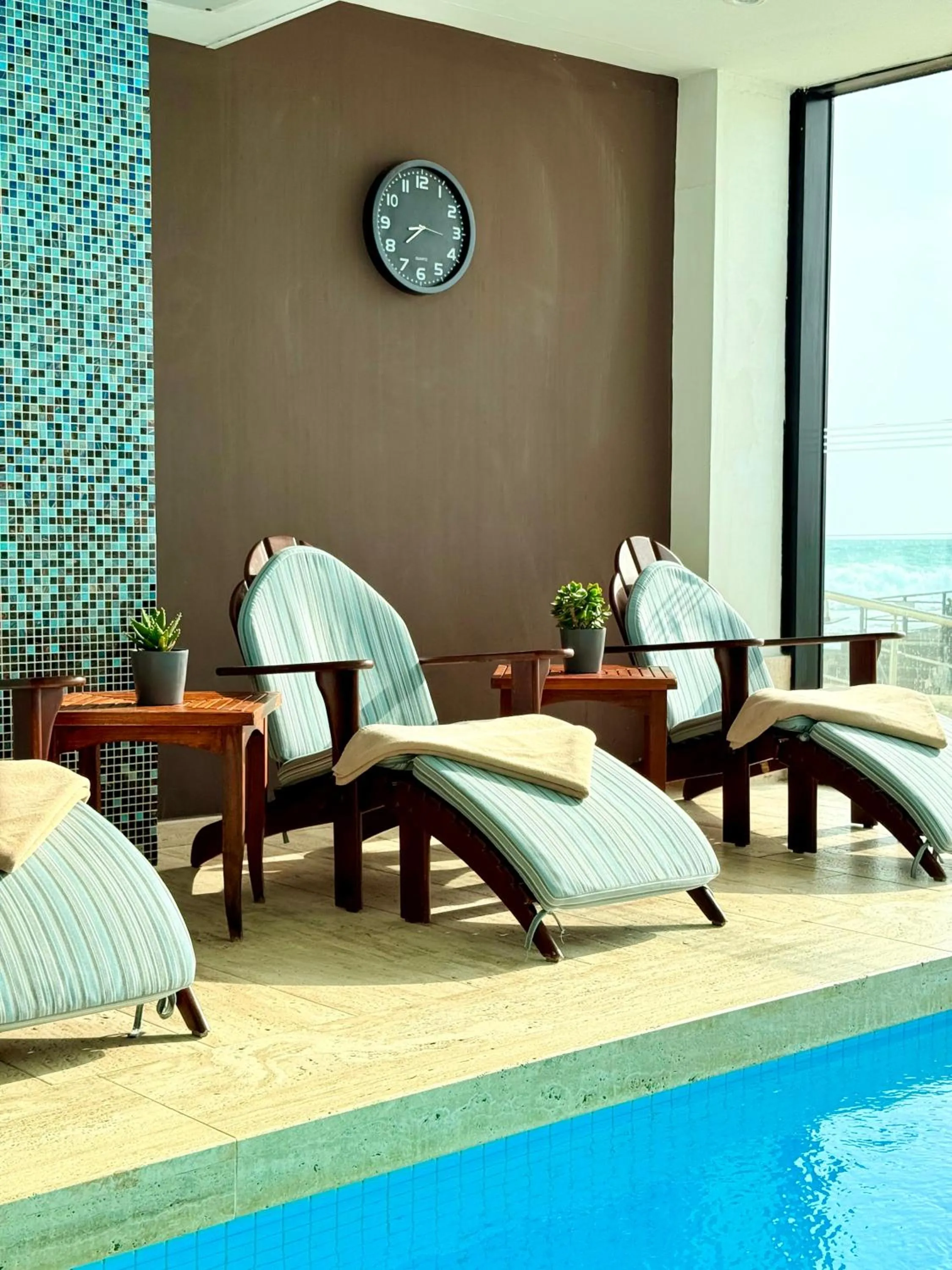 Swimming pool in Arkin Palm Beach Hotel