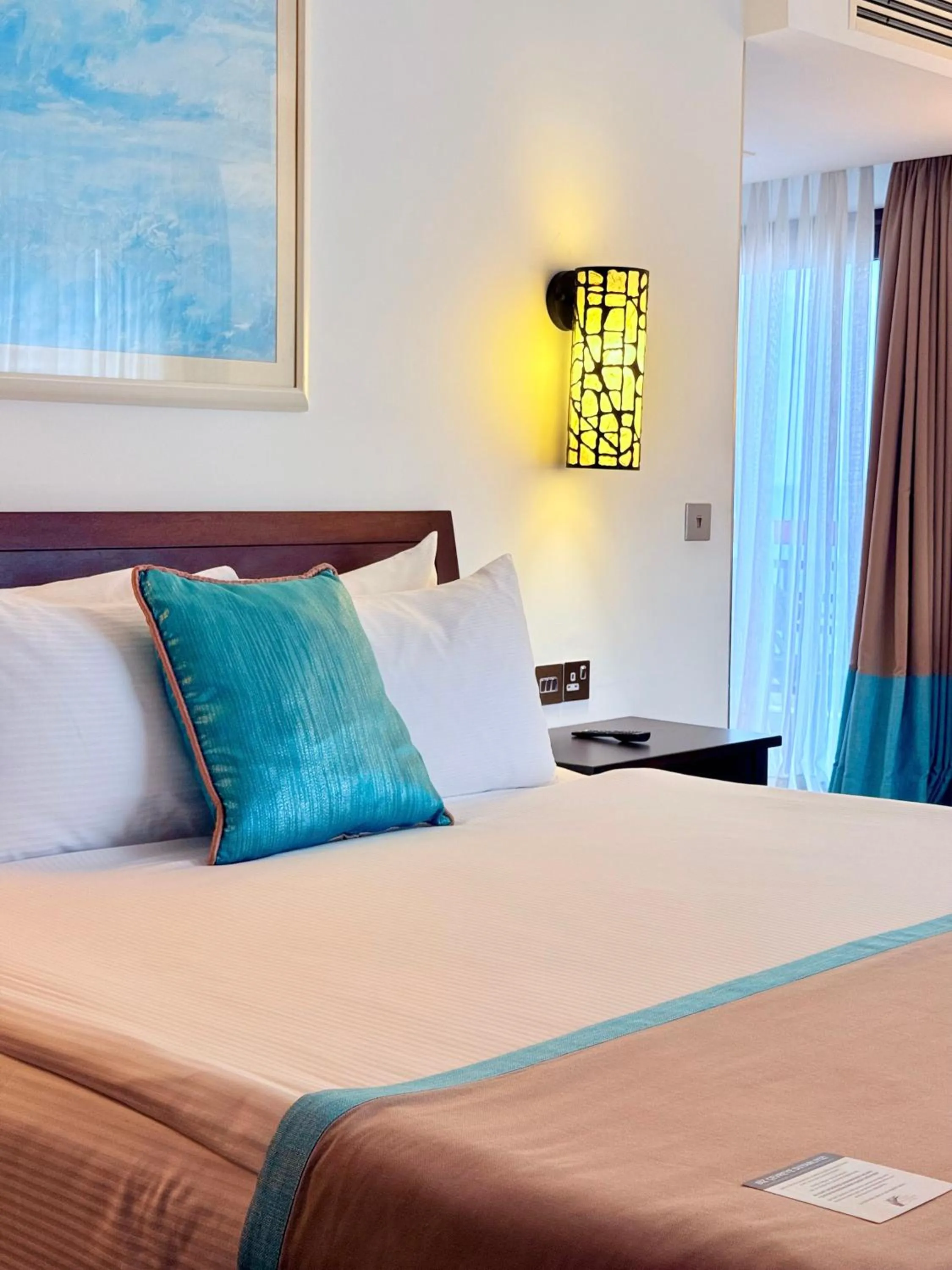 Bed in Arkin Palm Beach Hotel