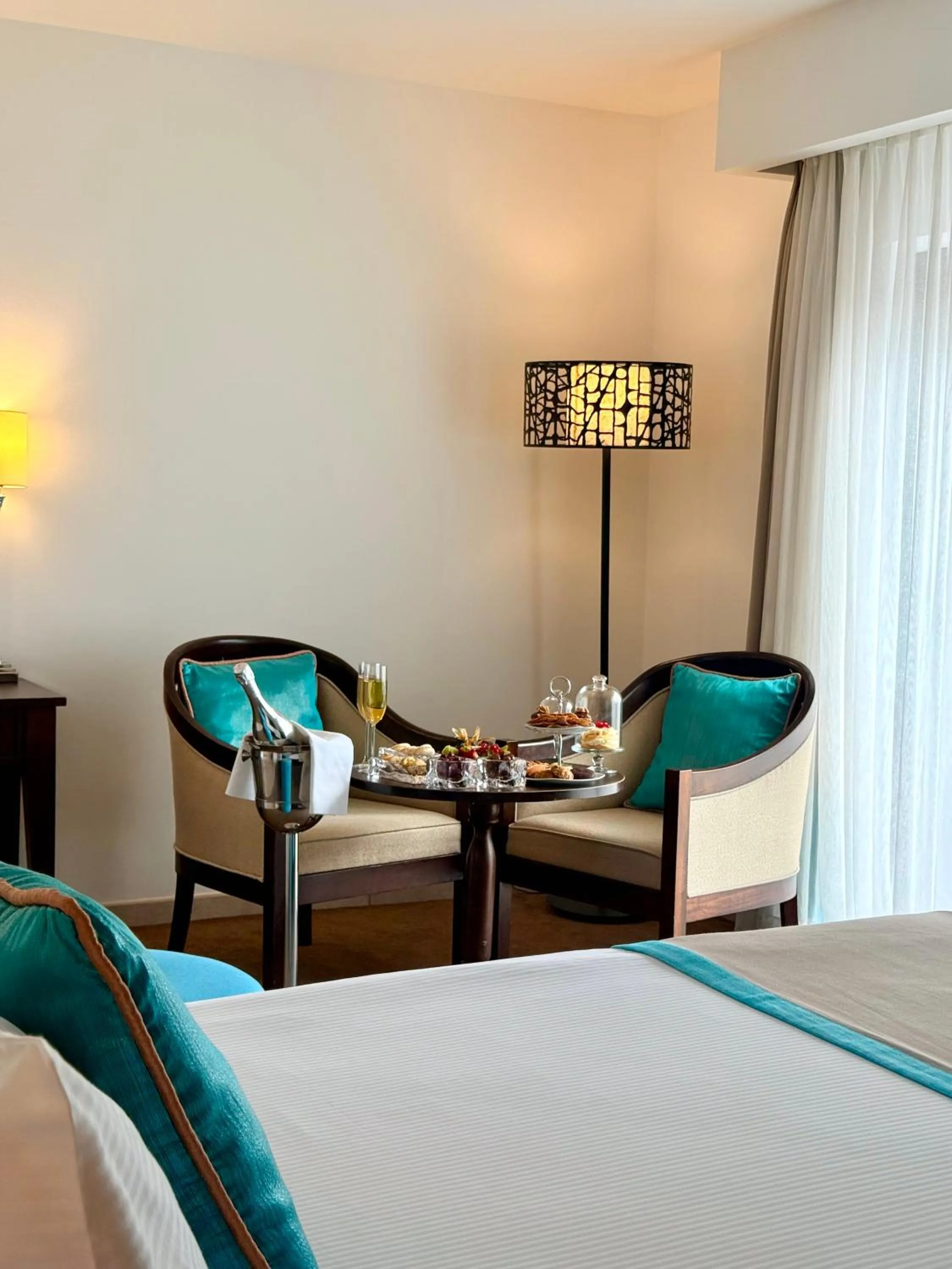 Living room, Bed in Arkin Palm Beach Hotel