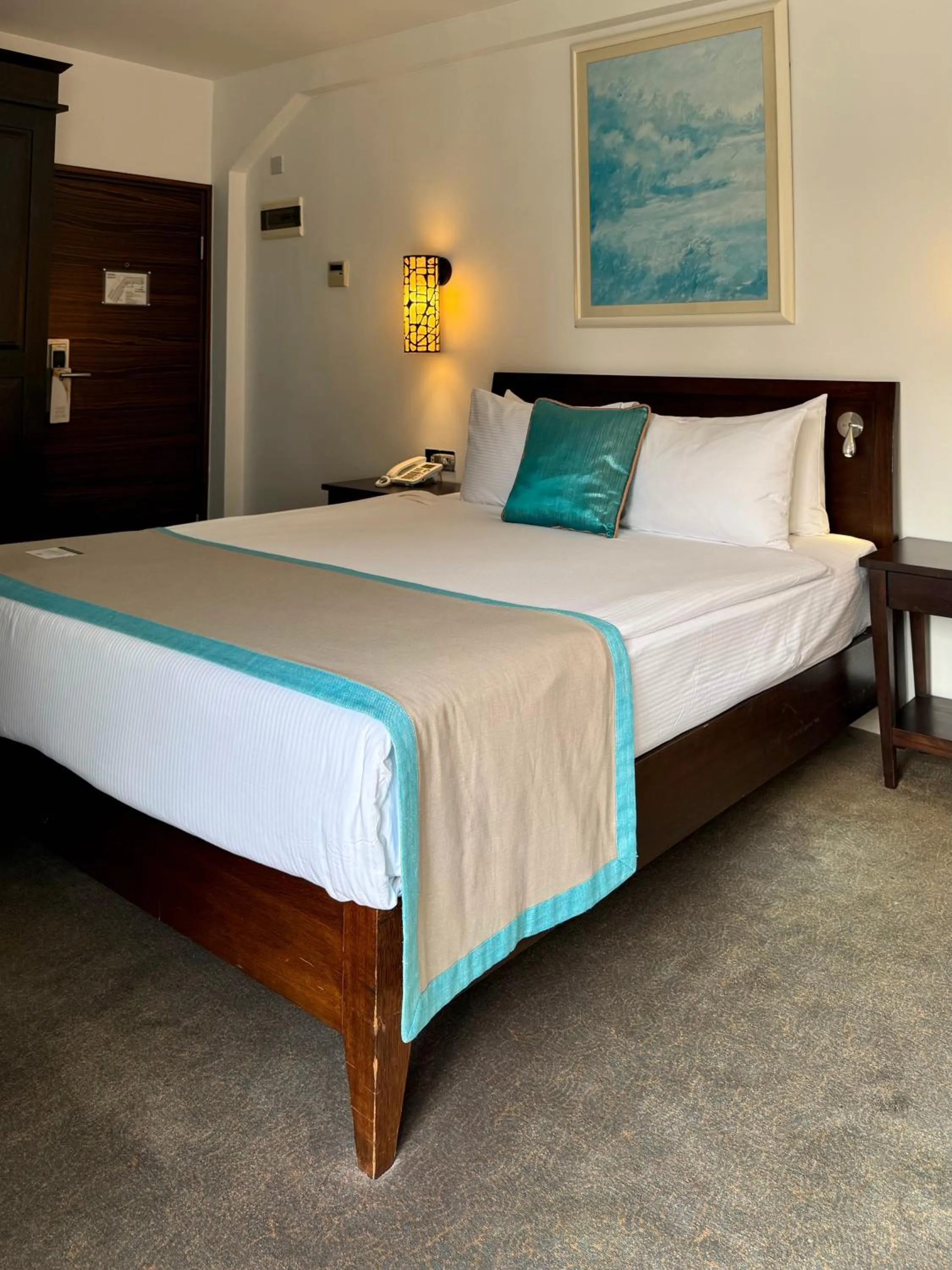 Bed in Arkin Palm Beach Hotel