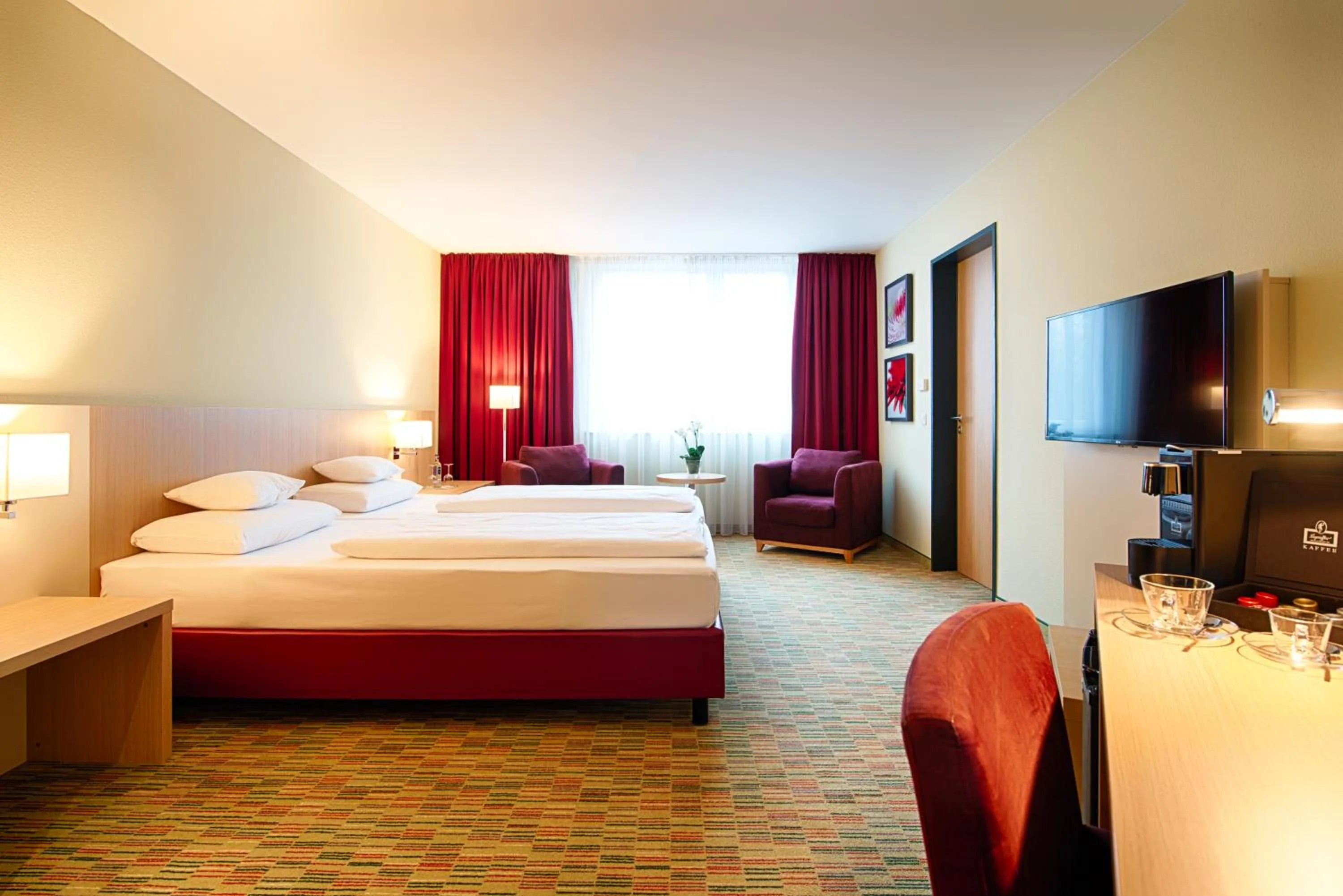 Photo of the whole room, Bed in Welcome Hotel Paderborn