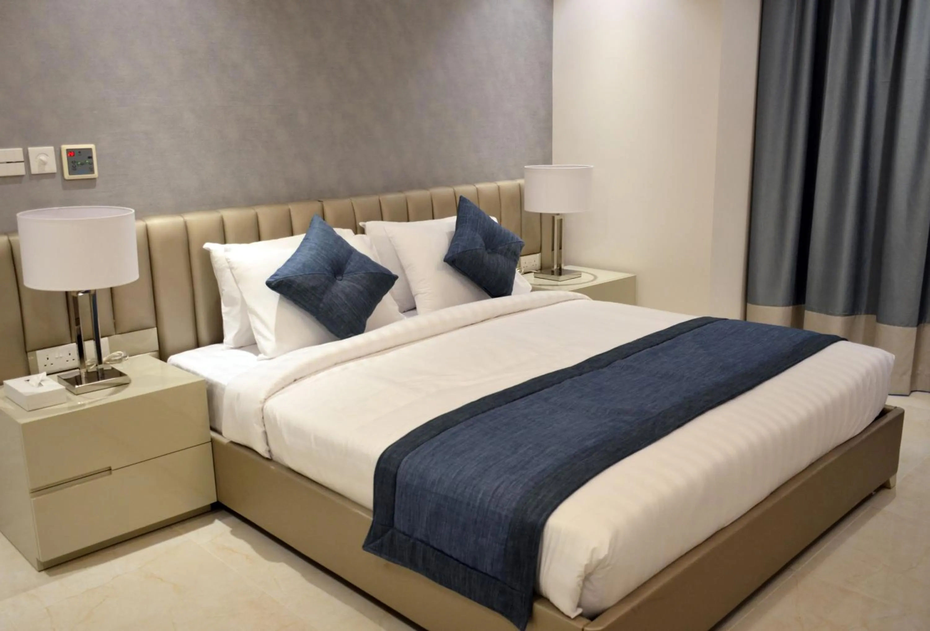 Bed in The Lodge Suites