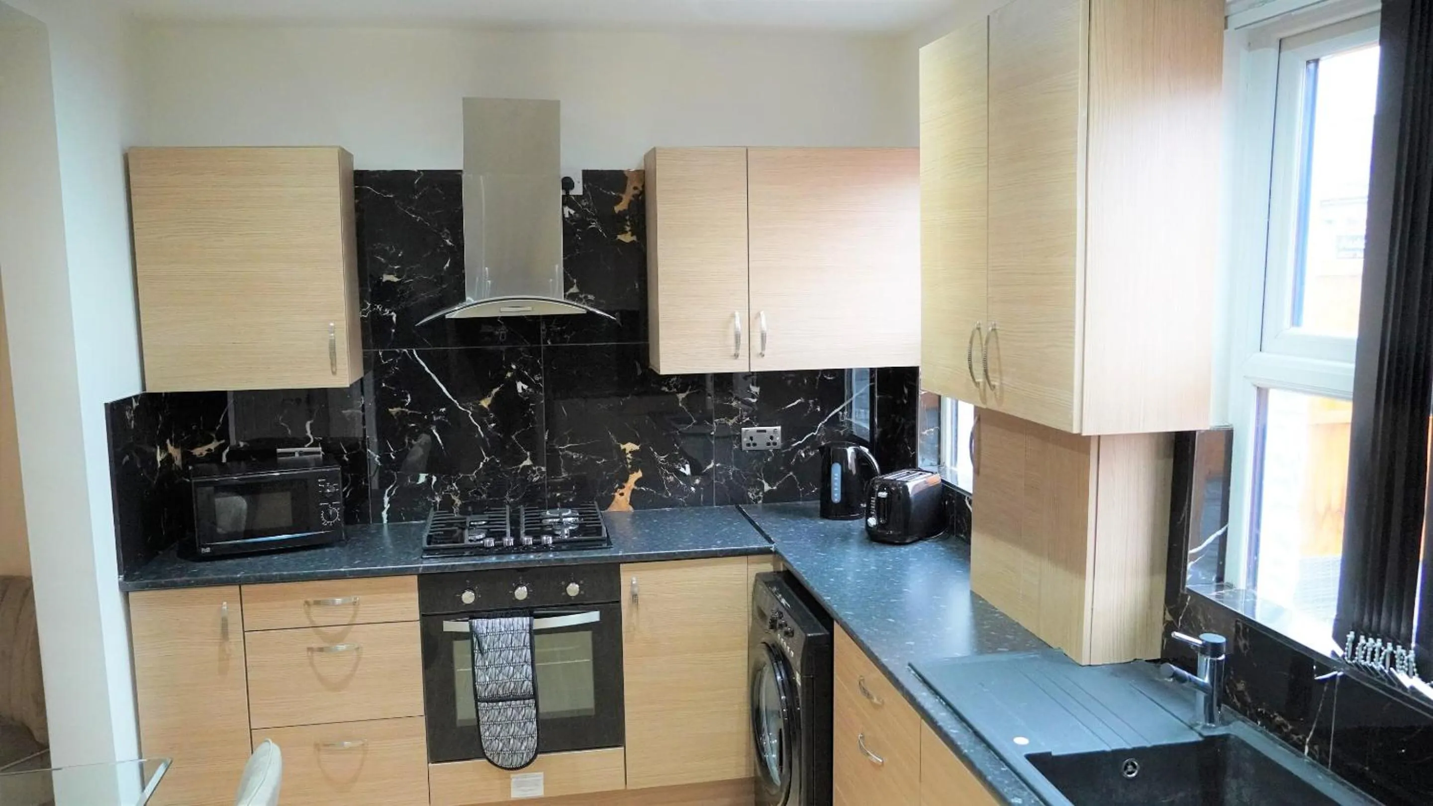 Kitchen or kitchenette in Cowper Townhouse