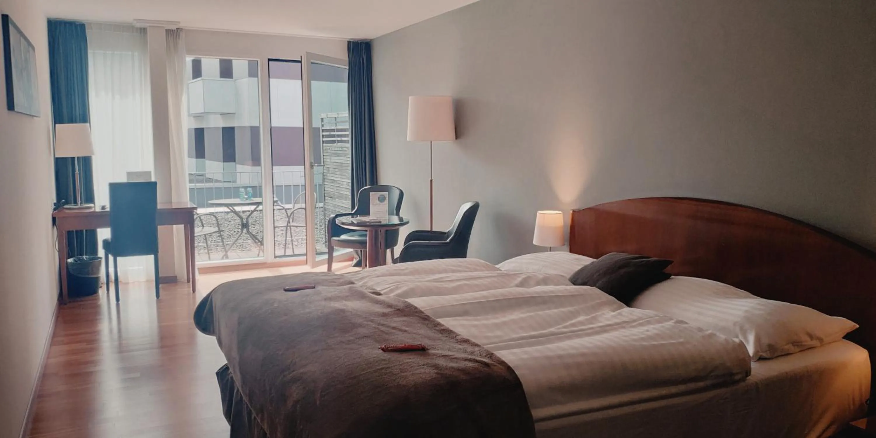 Bedroom, Bed in Hôtel Rallye & Entrées aux Bains de la Gruyère